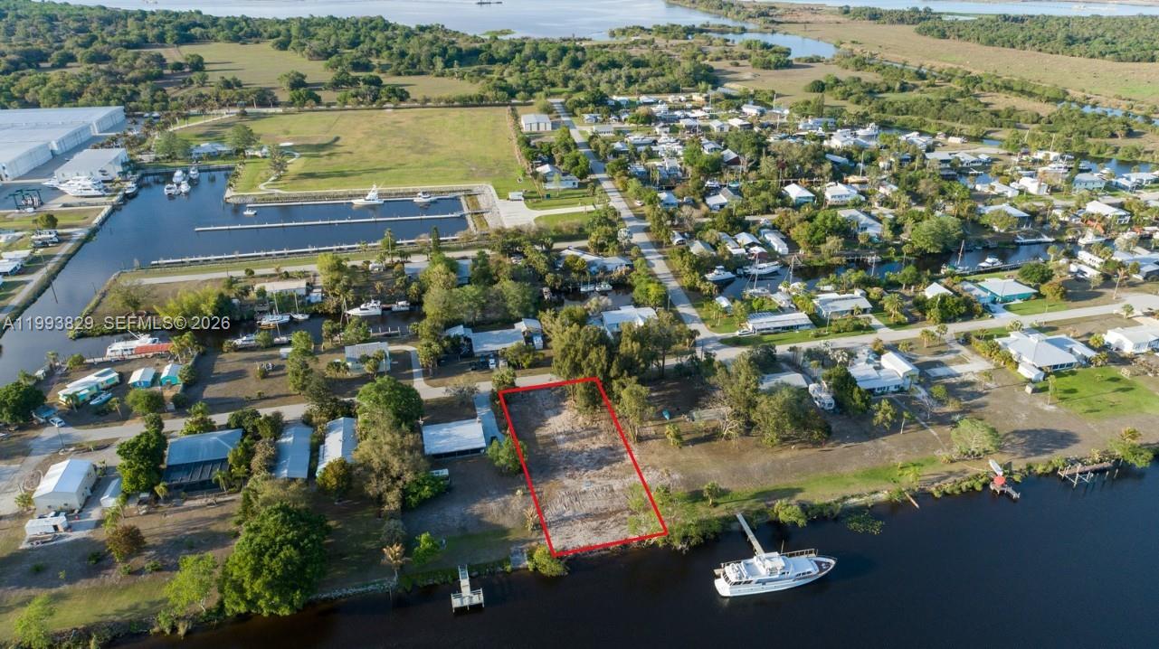 SELLER WILL FINANC!  $50,000 cash down and balance at 6% interest with a 5 year balloon payment.

Discover Old Florida waterfront living at 1035 W Anchor Lane in the quiet boating community of Turkey Creek in Ortona. This over ½-acre riverfront homesite offers approximately 100 feet of frontage on the Caloosahatchee River and is located just east of the Ortona Locks, providing excellent access to the Intracoastal Waterway and Lake Okeechobee. Tucked at the end of a private dead-end street, the property offers privacy and a protected setting known by boaters as a natural hurricane hole. Electric is available and fiber-optic internet is in the area; well and septic required. Conveniently located between LaBelle and Moore Haven, this property is ideal for building your dream riverfront home in a peaceful boating and fishing paradise.
