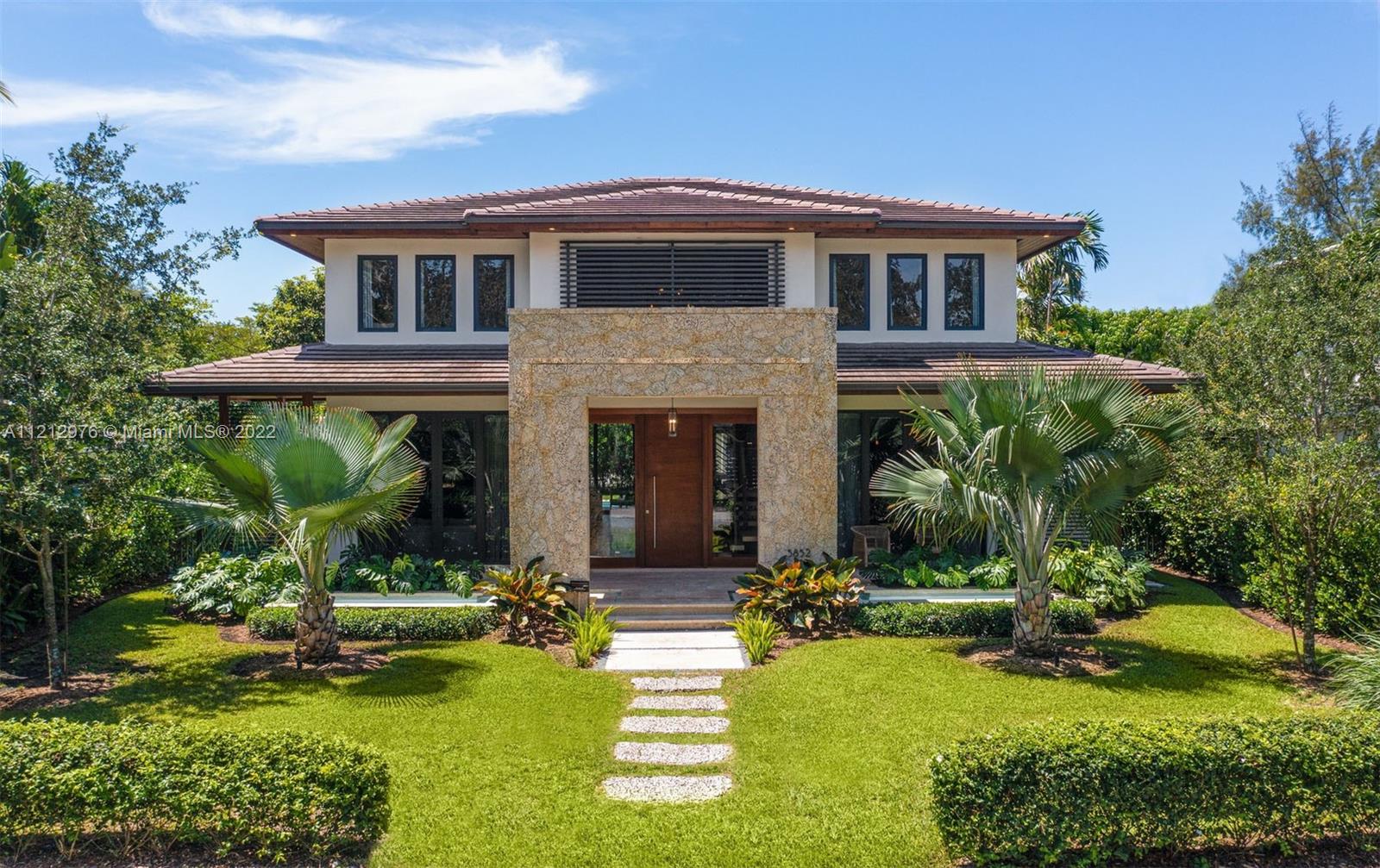 This  4,842 Sq. Ft architectural gem with 5 bedrooms and 6 full bathrooms is set apart by its spectacular design and spacious open floor plan. The kitchen comes with high-quality appliances, quartz island, custom cabinets and pantry, and opens to dining and family areas that include a glass wine cellar, elegant bar and sliding doors that seamlessly open to provide a true indoor and outdoor living experience. The beautiful main suite has a luxurious bath with a long marble vanity, spacious shower and soaking tub. The backyard is a dream, with covered dining, lounge and barbecue areas, pristine pool and lush tropical landscaping. There also are 2 laundry rooms and 2-car garage and an additional entrance on 78th St. Minutes away from shops, restaurants and excellent schools.