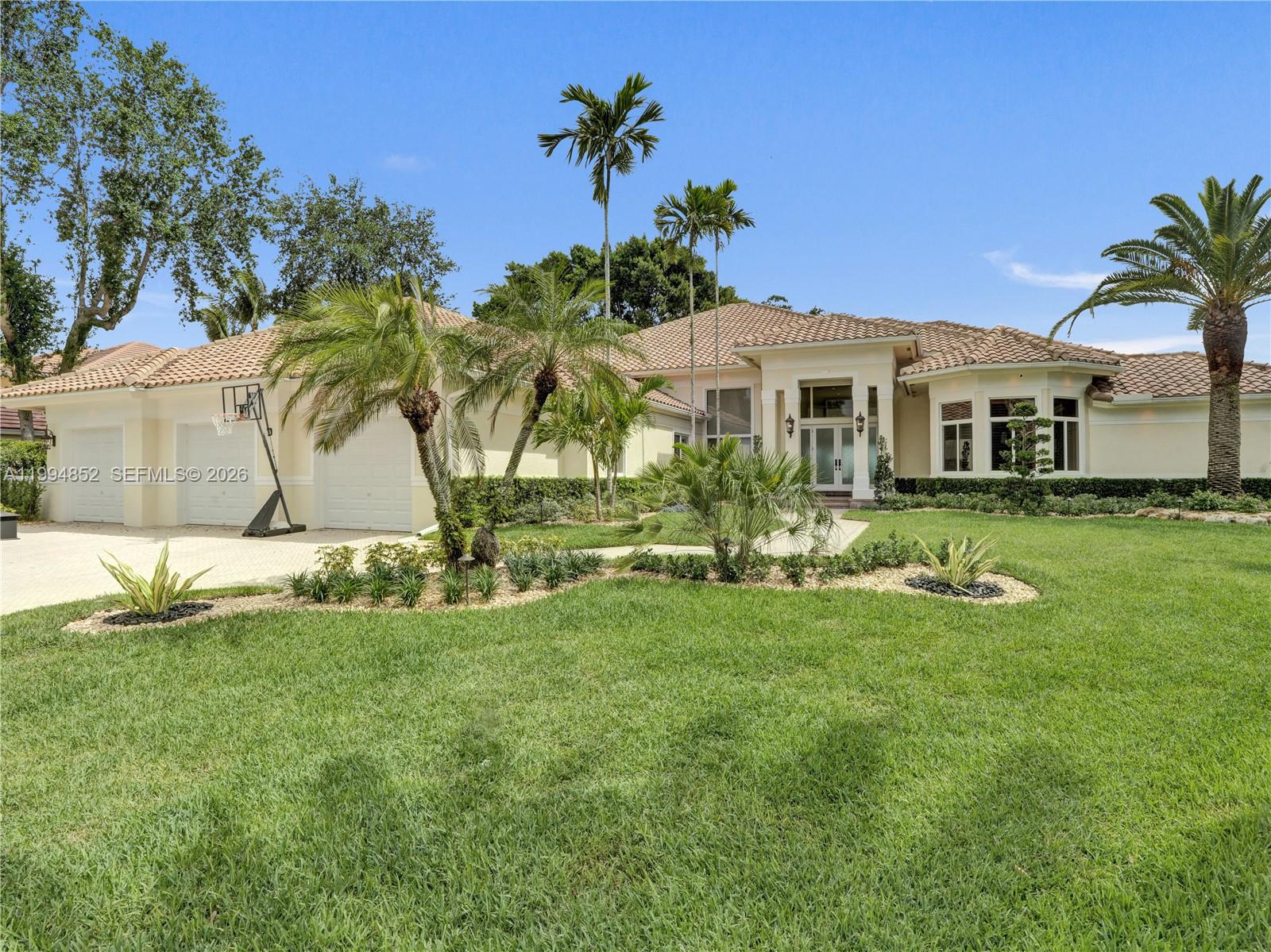 ONE-OF-A-KIND, PRISTINE & METICULOUSLY MAINTAINED RESIDENCE WITH ENDLESS WATER AND GOLF VIEWS! 

Presenting a rare and exceptional offering in the Princeton enclave of Weston Hills Country Club. Perfectly situated on an expansive 18,972 sq ft cul-de-sac lot, this residence showcases stunning, unobstructed golf and water views from nearly every vantage point. From the moment you arrive, the home makes a striking impression with its impressive curb appeal, grand driveway, three car garage, and beautifully curated landscaping, all set within a premier cul-de-sac location.

Inside, the home exudes both sophistication and warmth, featuring 5 spacious bedrooms, 4 full baths, and 2 half baths, plus a library/office. The thoughtfully designed 4,806 sq ft floor plan offers seamless flow for both everyday living and elegant entertaining. At the heart of the home is a stunning chef’s kitchen, complete with top-of-the-line appliances and exceptional finishes.

The outdoor living areas are truly spectacular and designed to impress, featuring a resort-style pool and patio, built-in barbecue, expansive entertaining areas, lush landscaping, premium turf, and a custom putting green.
Additional highlights include a home automation system that allows the homeowner to manage features of the home effortlessly from a central device, hurricane impact windows and doors, and a well maintained 10-year-old roof.

Located within one of Weston’s most exclusive and sought-after communities, this home offers the perfect blend of privacy, luxury, and lifestyle, with convenient access to top rated schools, shopping, dining, and major highways. This is a rare opportunity you won’t want to miss! Move-in ready and truly a must see, as photos simply do not capture its full beauty.