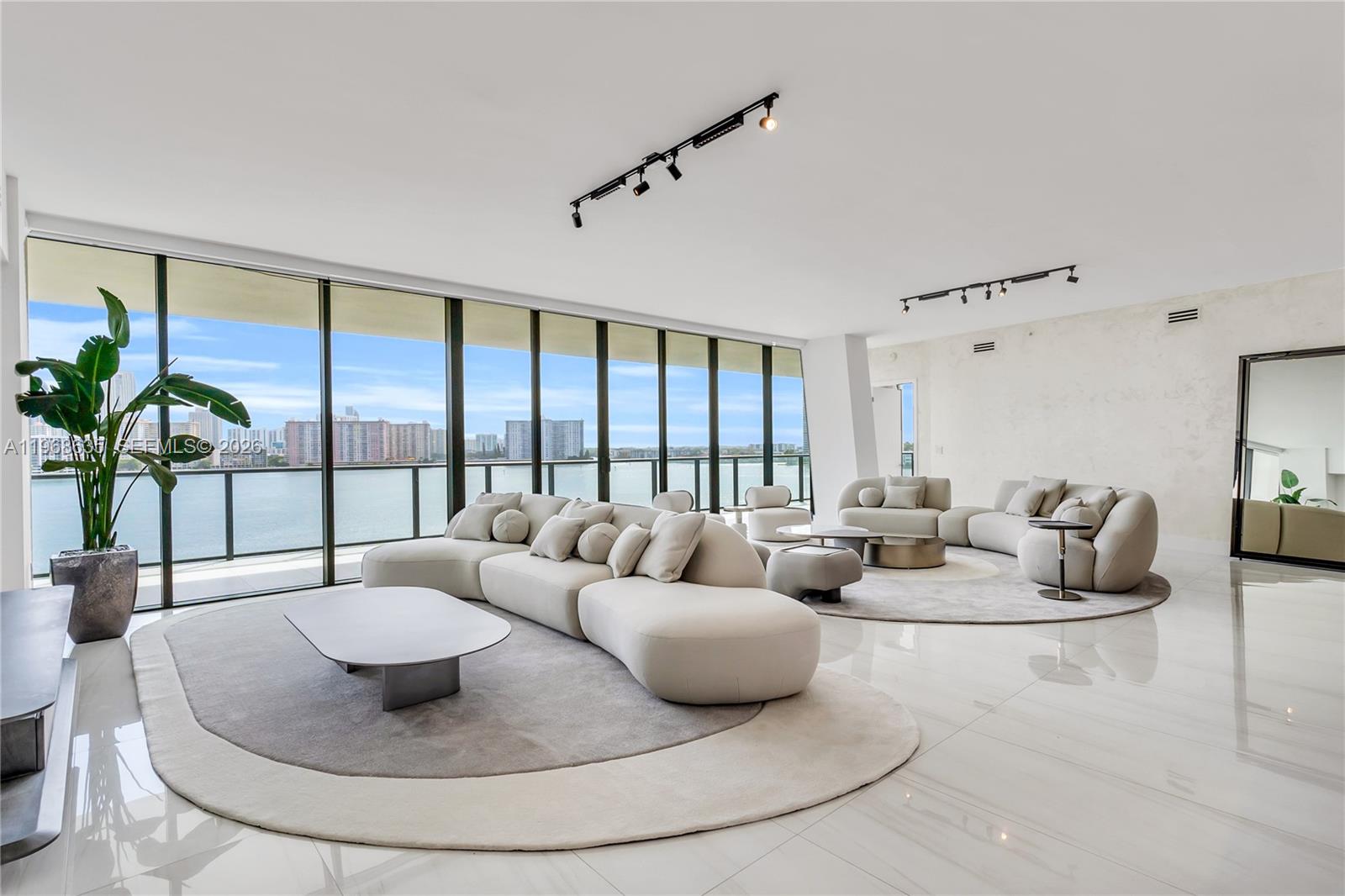 Luxury Corner Unit at PRIVE Island. Discover the pinnacle of luxury living in this breathtaking 4-bedroom, 4-bathroom corner unit at PRIVE Island. Spanning over 3,600 SqFt, this residence features exquisite high-end finishes and expansive floor-to-ceiling windows that showcase panoramic views of the ocean and Intracoastal Waterway. This exceptional unit includes three parking spaces and two storage units, along with exclusive access to PRIVE’s private marina. Indulge in world-class amenities, including 70,000 SqFt of indoor social spaces, two state-of-the-art gyms, a private restaurant, massage treatment rooms, a tennis court, a toddlers’ playroom, a billiards lounge, and two resort-style pools.