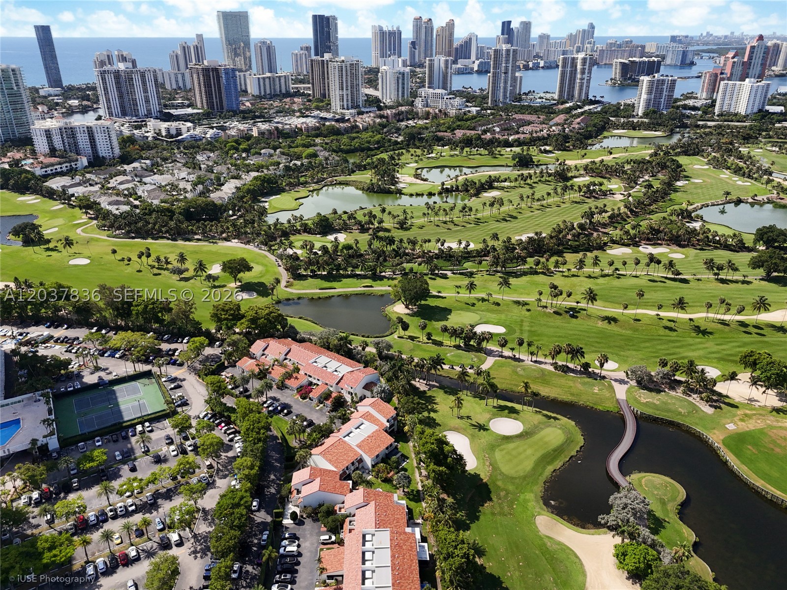 DISCOVER THE CHARM AND PRIVACY OF "DELVISTA TOWNHOMES", AN EXCLUSIVE ENCLAVE NESTLED IN THE HEART OF AVENTURA GOLF COURT. PRIVATE GATED COMMUNITY, THIS TOWNHOUSE HAS EXPANSIVE UNOBSTRUCTED LAKE AND TURNBERRY GOLF COURSE. "NEW ROOF"1 BEDROOM DOWNSTAIRS, GUEST BATH, LIVING AREA AND DINING-ROOM WITH A LARGE TERRACE LOOKING TO THE MAGNIFICENT GOLF COURT, STAIRCASE, MARBLE AND WOOD FLOORS, CUSTOM CLOSETS, AND 2 BEDROOMS UPSTAIRS. THE  PRIMARY SUITE HAS A LARGE BATH & 2 LARGE CLOSETS, & A TERRACE. COMMUNITY AMENITIES: 2 TENNIS COURTS, PICKLE BALL, HEATED POOL, CLUBHOUSE, GYM, JOGGING PATHS, SAUNA, BBQ AREA. MAINTENANCE INCLUDES CABLE AND INTERNET. RESIDENTS ENJOY A PEACEFUL, TREE-LINED ENVIRONMENT WHILE REMAINING JUST MOMENTS FROM PREMIER SHOPPING AT AVENTURA MALL, FINE DINING, PARKS, MARINAS, TOP RATED SCHOOLS, AND BEAUTIFUL BEACHES OF SOUTH FLORIDA.