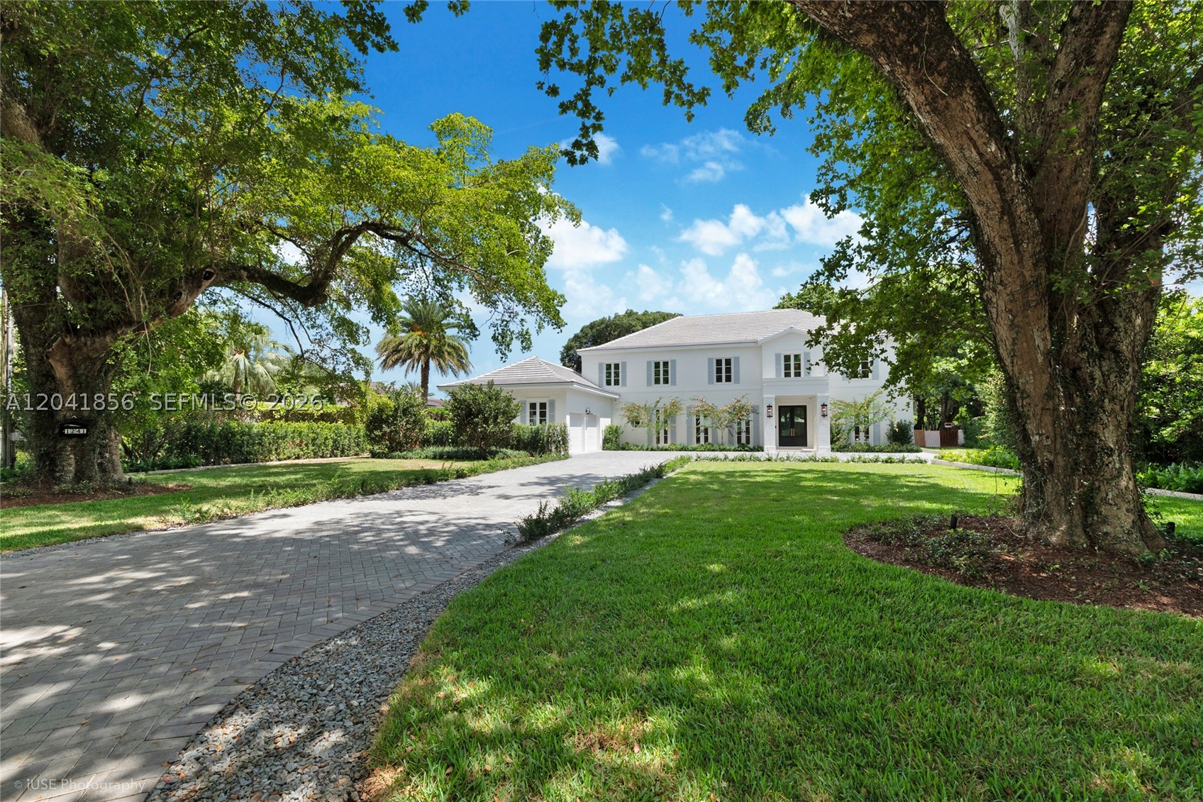 Newly built and designed, with only garage walls left standing, this French Contemporary estate offers a rare front-row vantage point overlooking the iconic Biltmore Hotel & Golf Course. Designed for luxury living, the residence features 6 en-suite bedrooms, 6 full baths, & 1 powder room, encompassing  6512 La as per plans, 7700 sf total  on an expansive 18,260-square-foot lot. The new expansive and luxurious master suite addition features a large dressing room and additional walk in closet as well as a sitting room & a luxurious marble bath suite and terrace, with front row views to the Biltmore. The thoughtfully designed floor plan blends timeless European elegance with contemporary sophistication, complemented by top-of-the-line appliances, including Sub-Zero, Wolf, and Miele. Floor-to-ceiling glass areas enhance the home’s natural light & captures the surrounding views, with stunning, unobstructed views of Coral Gables' mostrecognized landmarks. An elegant rear façade with abundant glazing and multiple French doors opening to the grounds enhances the home's seamless indoor-outdoor flow. The outdoor living experience is completed by a heated pool & spa, creating a private resort-style setting. Every element of the residence is being rebuilt to the highest standards, offering buyers the opportunity to acquire a virtually new construction in a premier location.Pending back fence, railings, final completion. NEW PICTURES SOON