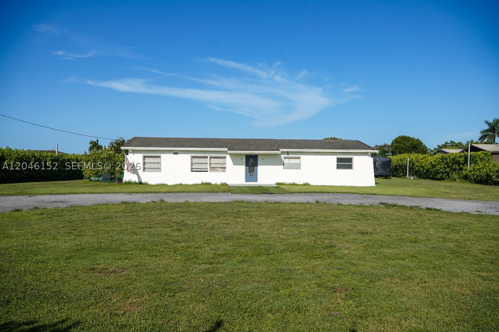 If you've been searching for land, privacy, and unlimited potential, this is the property you've been waiting for! Situated on 1.25 acres, this 3-bedroom, 2-bath home offers 1,560 SF of living space and gives buyers the opportunity to create their dream property while enjoying the peace of mind that many of the major improvements have already been completed. Recent updates include a new electrical panel and wiring (2025), roof (2021), mini-split A/C (2025), water heater (2025), well (2024), and septic system serviced in 2025. Built with concrete block construction, the home also features concrete flooring and a nearly completed covered terrace ready for your finishing touches. The property includes two RV hookups, conduit already installed for security cameras and exterior lighting, permitted fencing and approaches, plus a storage container and detached gray shed that convey with the sale. Refrigerator, microwave, range, washer, and dryer are included. Whether you're looking for space for your RVs, boats, work equipment, animals, or simply the freedom to customize a property to fit your lifestyle, this is an exceptional opportunity with many of the expensive upgrades already taken care of.