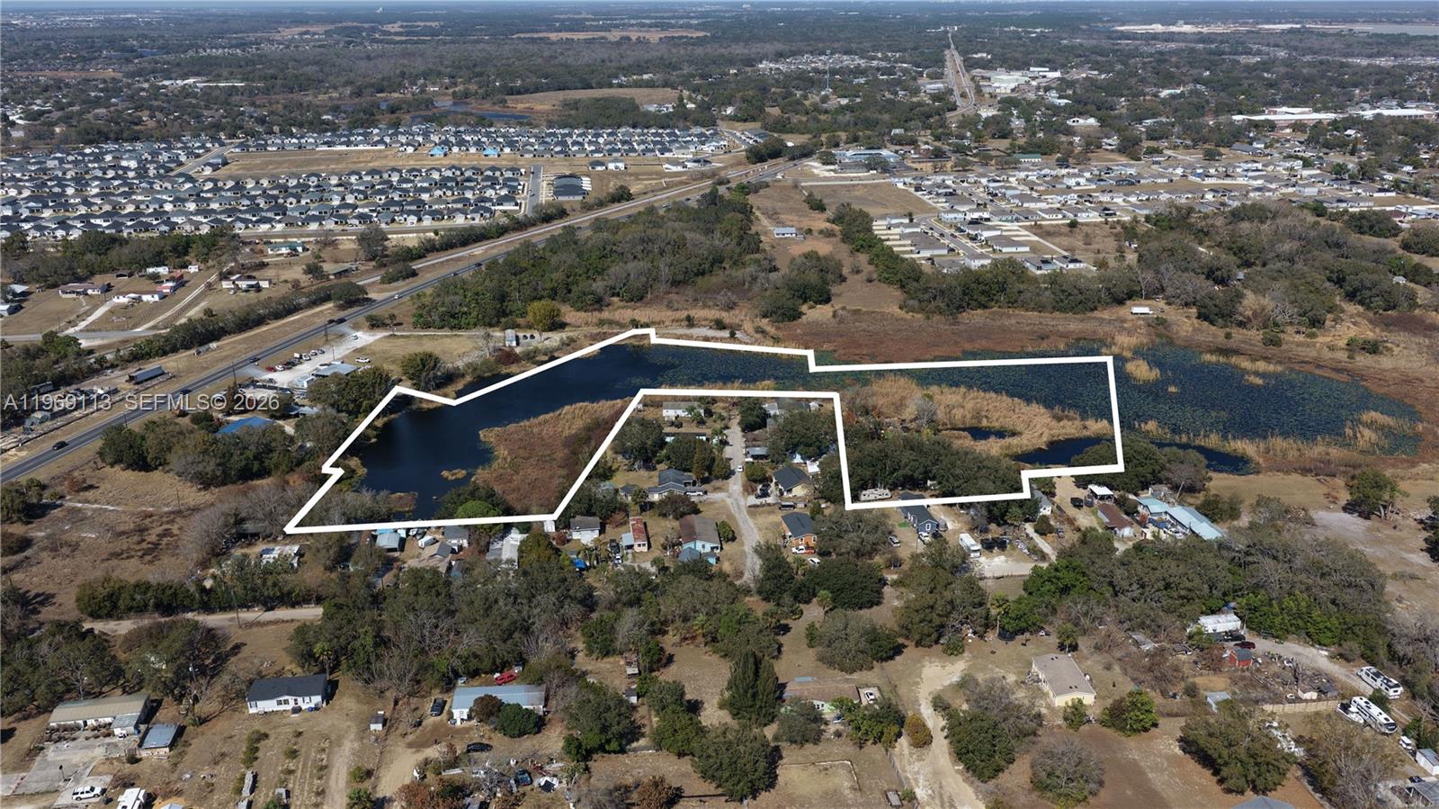 7.28± acres located off U.S. Hwy 17-92N. Property is landlocked (no recorded legal access) and is predominantly covered by water/wetlands. Land is not currently buildable. Buyer to perform all due diligence and verify access, zoning, floodplain/wetlands status, and any future use potential with the county and all applicable agencies.