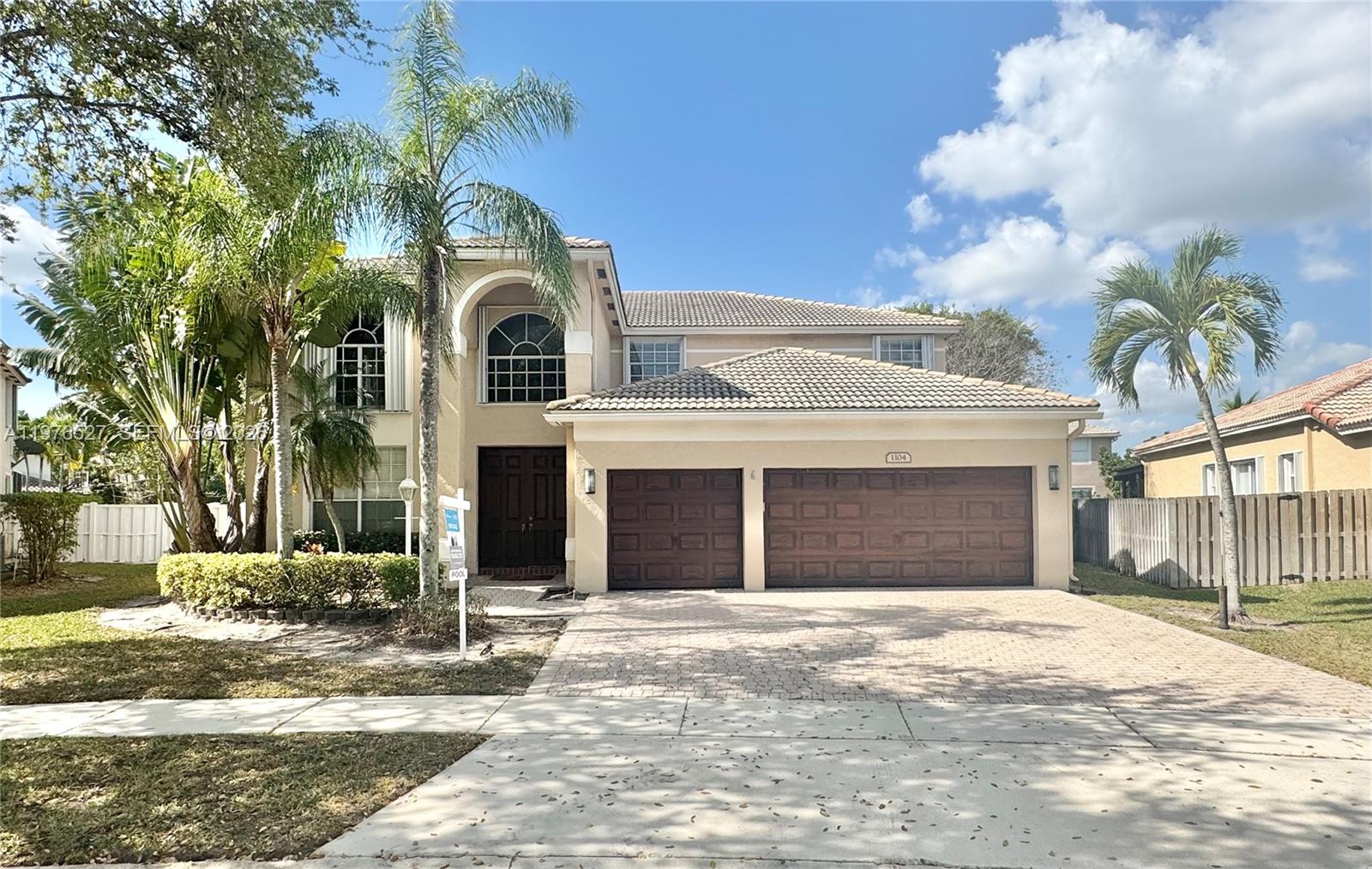 This elegant 4 bedroom plus loft, 3.5-bathroom home offers a luxurious living experience in the resort style gated community of Pembroke Falls in Pembroke Pines. Situated on a 9,983 sqft lot, it features a spacious second-floor loft, a downstairs master suite, and upgraded wood flooring throughout. The kitchen granite countertops, a large island, premium appliances, and custom wood cabinetry. A wine cellar stores up to 400 bottles, perfect for collectors. Outdoors, enjoy a screened-in patio and saltwater pool, ideal for relaxation and entertaining. A 3 car garage adds convenience. Residents enjoy a grand clubhouse, pools, fitness center, tennis courts, and 24-hr security, with easy access to shopping, dining, schools, parks, and expressways. Let me know if you'd like further refinements!