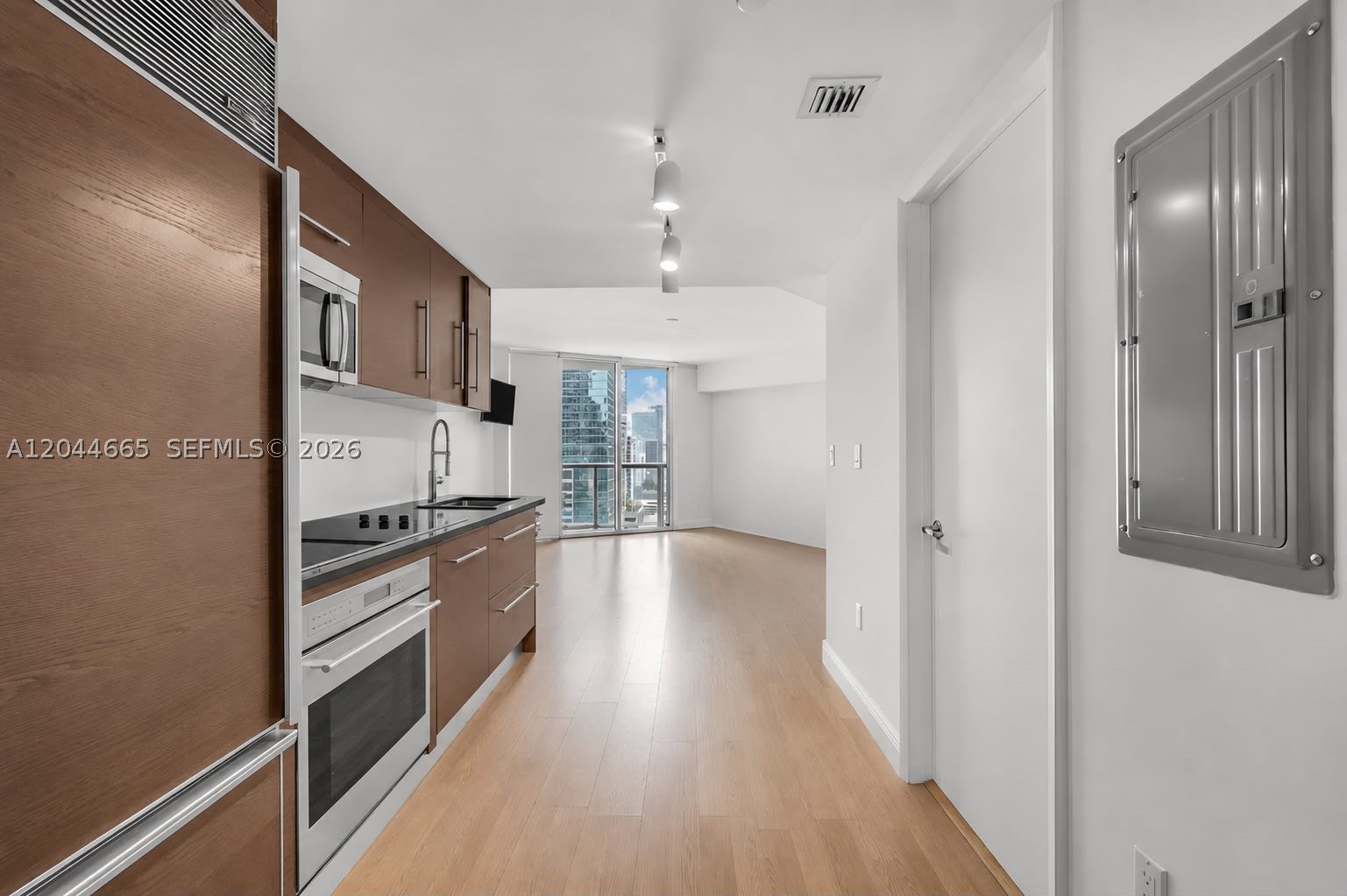 INVESTOR OPPORTUNITTY!!! Experience luxury living at Icon Brickell Tower I. This stylish studio features an open-concept layout with floor-to-ceiling impact glass, a modern European-style kitchen, premium finishes, walking closet, and a private balcony showcasing breathtaking panoramic views of the Miami River and city skyline. Enjoy resort-style amenities including a spectacular waterfront pool, state-of-the-art fitness center, spa, concierge, valet, and 24-hour security. Located in the heart of Brickell, just steps from Brickell City Centre, premier dining, shopping, and entertainment. Currently tenant-occupied with a lease in place through May 2027, offering an excellent investment opportunity with immediate rental income.