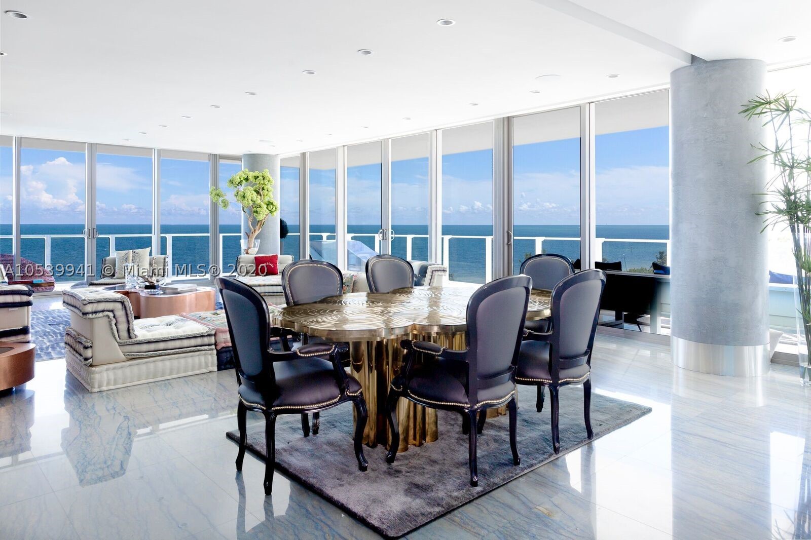 One of its kind corner unit with views of Ocean, Bay,City Skyline, Sunrise & Sunset. 4,080sf under AC (4 units). Flow-through corner unit w/ 2000sf wrap-around terrace. 4BED+7.5BATH + maids quarters. Master Bath His & Hers marble thru-out with stainless steel bathtub with views of the ocean. Finished floors with top of the line Italian Marble. Finished to perfection! Exclusive Boutique Resort Lifestyle with Spa facilities, Fitness center, lap pool, Infinity pool with Restaurant,Tennis clay court, Putting green, kids room, tv room and party room with kitchen facilities. 24hrs. concierge, gated security, valet. Definitely the Best building in KB. I could describe this corner unit as your glass mansion on the ocean in paradise !