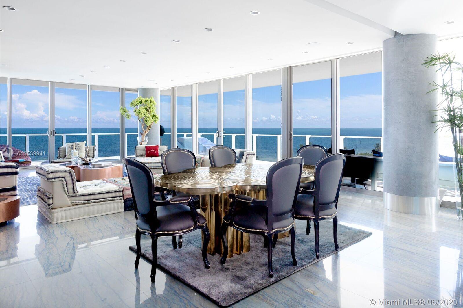 One of its kind corner unit with views of Ocean, Bay,City Skyline, Sunrise & Sunset. 4,080sf under AC (4 units). Flow-through corner unit w/ 2000sf wrap-around terrace. 4BED+7.5BATH + maids quarters. Master Bath His & Hers marble thru-out with stainless steel bathtub with views of the ocean. Finished floors with top of the line Italian Marble. Finished to perfection! Exclusive Boutique Resort Lifestyle with Spa facilities, Fitness center, lap pool, Infinity pool with Restaurant,Tennis clay court, Putting green, kids room, tv room and party room with kitchen facilities. 24hrs. concierge, gated security, valet. Definitely the Best building in KB. I could describe this corner unit as your glass mansion on the ocean in paradise !