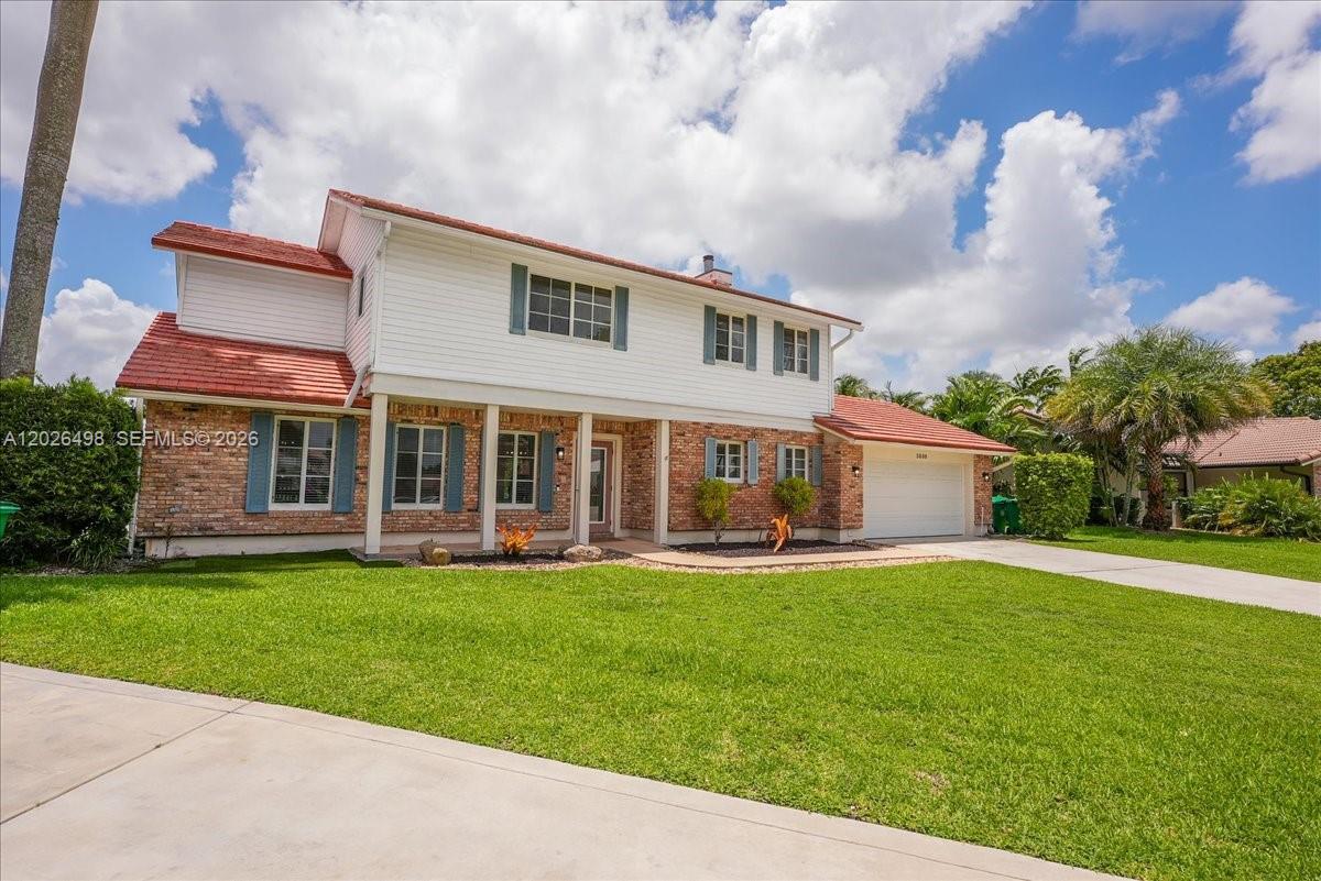 Stunning lakefront pool home located on a quiet cul-de-sac, the perfect home that truly has it all. Featuring 4 bedrooms, 3.5 bathrooms, a 2-car garage, and a large driveway with space for up to 4 additional vehicles. This beautifully designed property offers the ideal combination of comfort, space, and functionality. Features include impact windows and impact doors throughout, a cozy fireplace, and an open, inviting layout filled with natural light. Enjoy breathtaking lake views, an oversized yard, private pool and spa perfect for entertaining or simply relaxing, and plenty of room for family living.
Outdoor living with the private pool and a new 2026 pool pump. The yard has a sprinkler system fed directly from the lake, resulting in significant water savings. Additional features include a 2007 roof, a 2019 air handler, an approximately 10-year-old water heater, and solar hot water panels for enhanced energy efficiency. The purchase price reflects the opportunity to update certain cosmetic features, such as flooring and bathrooms, to match the new owner’s personal style. Finishes can always be remodeled, but you cannot recreate a premium cul-de-sac location, expansive lake views, an oversized yard, private pool, generous parking, and the exceptional space this home already offers. With outstanding bones and an unbeatable setting, this property is the perfect canvas to create your dream home. Adding to its appeal, the HOA fee is only $350.00 per year.