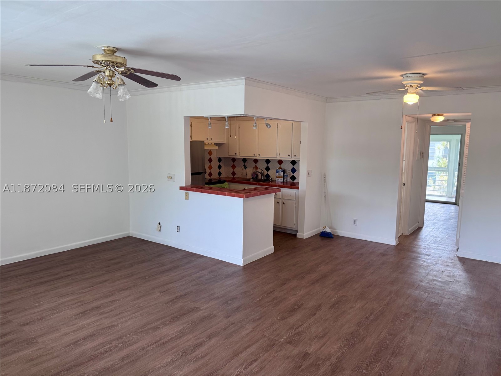 This bright and well-maintained 1-bedroom, 1.5-bath condo is located on the second floor at 19 Newport Ct #19 in Deerfield Beach, within the prestigious Century Village community. Recently refreshed with upgraded flooring throughout and a fresh interior paint job, this unit offers a clean, modern, and inviting living space. Residents enjoy an abundance of amenities, including a pool, fitness center, movie theater, transportation services, and a wide variety of social activities and classes. Conveniently located near shopping, dining, and just minutes from the beach, this condo provides the perfect blend of comfort, convenience, and active living. Please note that Century Village is a 55+ community.