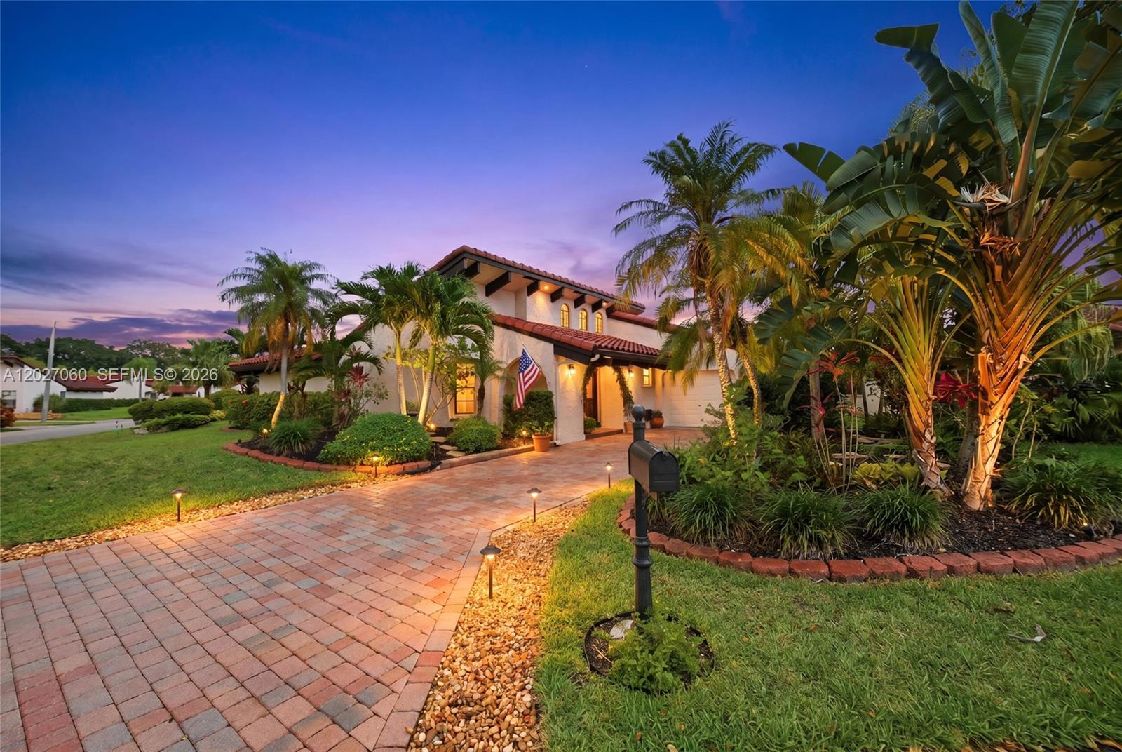 Don't Miss This Stunning 3-Bed/2-Bath Detached Villa Nestled On An Oversized Lot In The Heart Of Tamarac! This Spacious Home Greets You W/ Soaring Vaulted Ceilings & An Open, Airy Feel That Immediately Sets It Apart. Bright Updated Eat-In Kitchen Features SS Appliances, Granite Countertops, Rich Wood Cabinetry, A Stylish Glass Tile Backsplash, & A Breakfast Bar — Perfect For Casual Dining & Entertaining. 3rd Bedroom/ Office/Den Adds Exceptional Flexibility To The Floor Plan. Large Primary Suite Boasts Its Recessed Lighting, A Ceiling Fan, & Two Generous Walk-In Closets. Primary En-Suite Bathroom Impresses W/ Dual Sinks, A Large Mirror, A Shower/Tub Combination, & A New Toilet. The Second Full Bathroom Features A Walk-In Shower W/ A Sleek Glass Enclosure & Elegant Stone Flooring. Step To Your Private Screened Patio, A Perfect Space For Enjoying Florida's Beautiful Weather Year-Round. This Home Also Has 2 Exterior Patios. Additional Highlights Include A Custom Stone Wall, 1-Car Garage, An Extended Driveway With Pavers & Room For 3 Cars. Newer Tile Roof (2016), Full Size W/D, Brand New AC (2025), Complete Accordion Shutters, And A Brand New Water Heater (2026). HOA Covers Lawn & Pool Maintenance. Residents Also Enjoy A Community Pool, BBQ/Picnic Area, And Is Pet-Friendly. Access To Newly Renovated Woodmont Country Club, Golf, Pickleball, and Tennis,  Conveniently Located Near Top Shopping, Dining, & Major Highways — This Amazing Gem Won't Last Long. Schedule Your Showing Today!