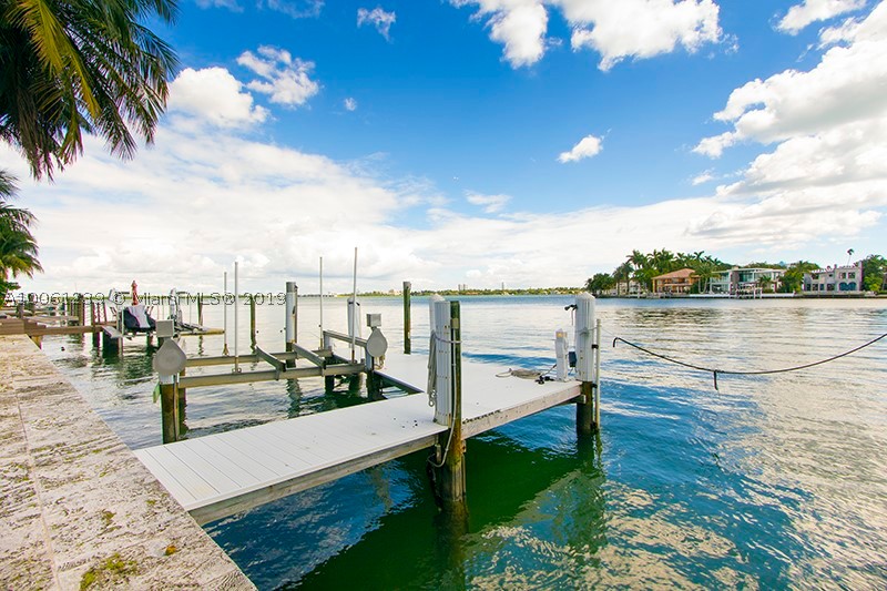 Art Deco home, on the luxurious Venetian Islands, in reasonably good condition. House has been kept up, but is ready for a complete renovation. Great location with wide bay views to the east and 90 feet of water frontage. Easy to show.