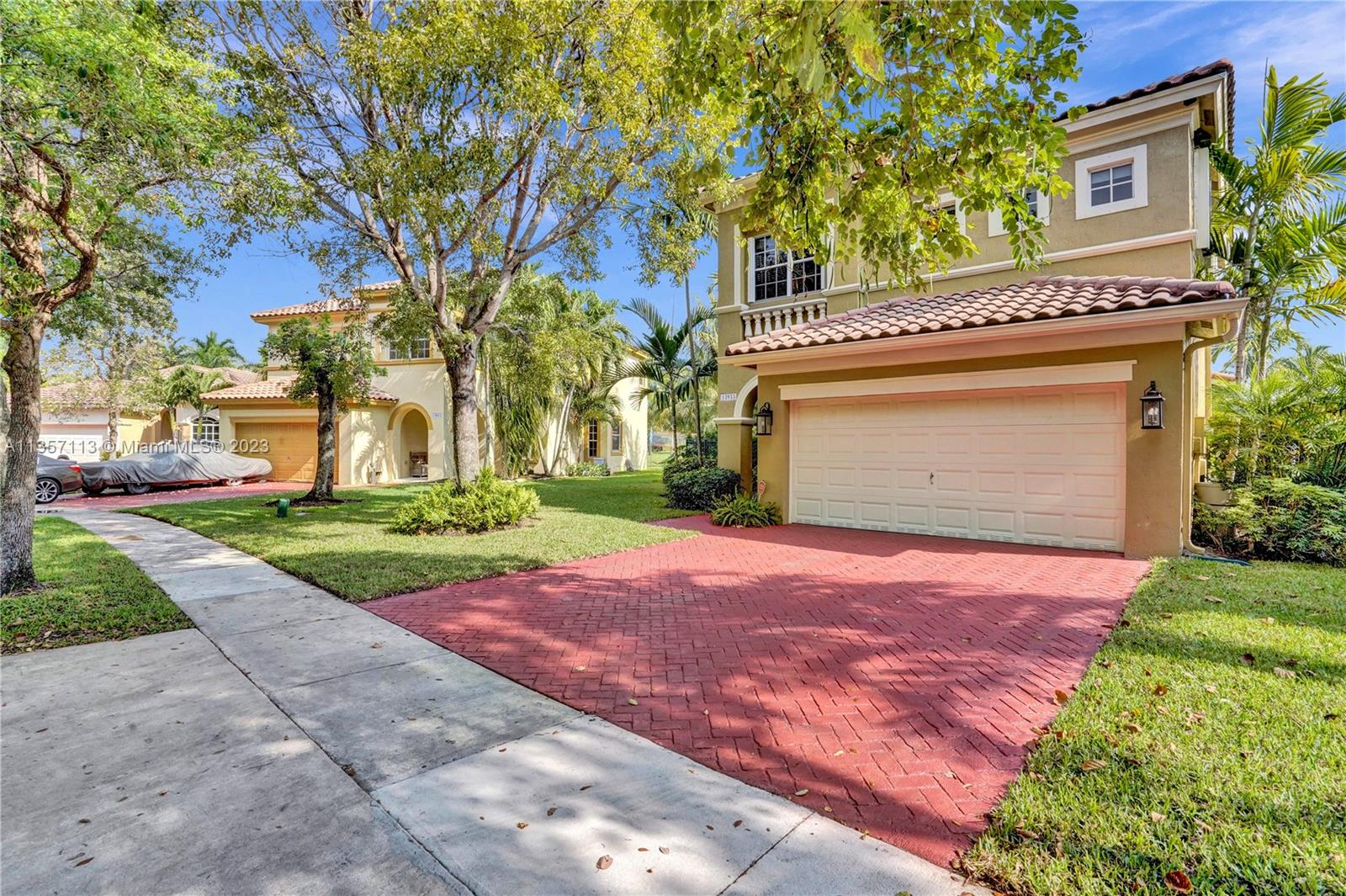 This waterfront home with a pool is absolutely stunning and very spacious! Bright & open floor plan with large social areas. An expansive gourmet kitchen with Quartzite counter tops and top-of-the line stainless steel appliances. The primary bedroom is spacious and offers a large walk-in closet.  Fully remodeled bathrooms, new porcelain flooring, fresh interior & exterior paint, A/C replaced 2 years ago, vaulted ceilings, new iron railing on the stairs, surround sound, crown moldings, elegant chandelier and light fixtures, smart light control, second floor accordion shutters. Gorgeous backyard boasts a sparkling pool, an amazing lake view, lush landscaping, making it the perfect place for entertaining! This home is ready to move in!
