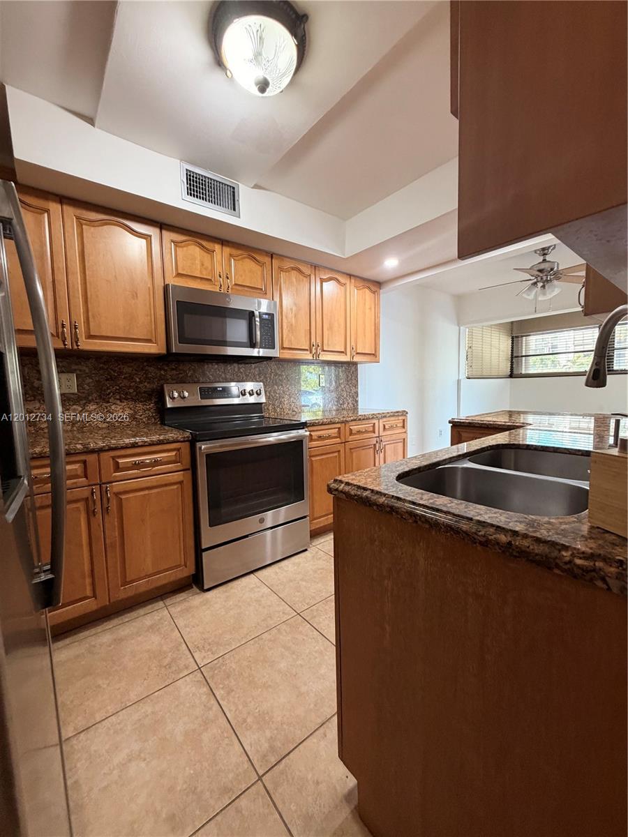 PENINSULA AT INTL GARDENS - Residential