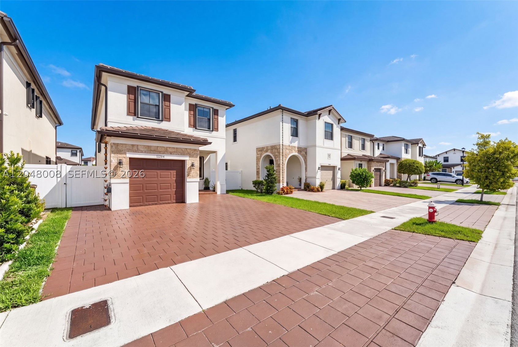 Substantially remodeled and move-in ready! This stunning 4-bedroom, 2.5-bath smart home has been thoughtfully upgraded with high-end finishes throughout. Features include a kitchen with oversized island, custom lighting, electric blinds, shutters, spacious living areas, and modern finishes that blend style with functionality. The open-concept layout is perfect for everyday living and entertaining, while the beautifully updated interior offers a true turnkey experience. Conveniently located near shopping, dining, schools, and major highways. A must-see for buyers seeking luxury, comfort, and modern technology. Space to build private pool and the best part it has a low HOA. Schedule your private showing today! SELLER MOTIVATED!!!