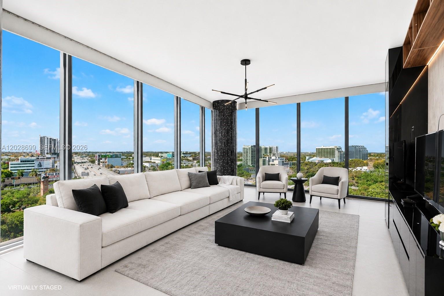 If you've been searching for a spacious 2-bedroom condo in Edgewater that actually feels like a home, this is the one to see. At 1,449 SF, this corner residence gives you room to live, work, and grow with a layout most units at this price simply cannot offer.
This home sits at the epicenter of District 36, NE 36th Street's emerging luxury corridor. A 50-story Anantara Resort and Residences by One Thousand Group, ELLE Residences, and Jean-Georges Miami Tropic with Michelin-starred dining are all rising within walking distance. The neighborhood is transforming and this unit puts you in the middle of it at today's pricing. Walk to the Design District. Walk to Midtown. The Baywalk extension to Downtown is underway.
Inside, the home has been thoughtfully updated — new floors, custom millwork with integrated LED lighting, automatic blinds, and floor-to-ceiling impact glass throughout. Two private suites, guest powder room, and a semi-private elevator serving only three residences per floor. Designed by Arquitectonica.
The building's financials are equally strong. No active or planned special assessments. A lobby renovation is designed, approved, and paid for from reserves. HOA covers water, cable, insurance, and all amenities — two pools, cold plunge, sauna, gym, BBQ deck, mini market, concierge, and valet.
A great home today with serious upside tomorrow. Schedule your private showing.