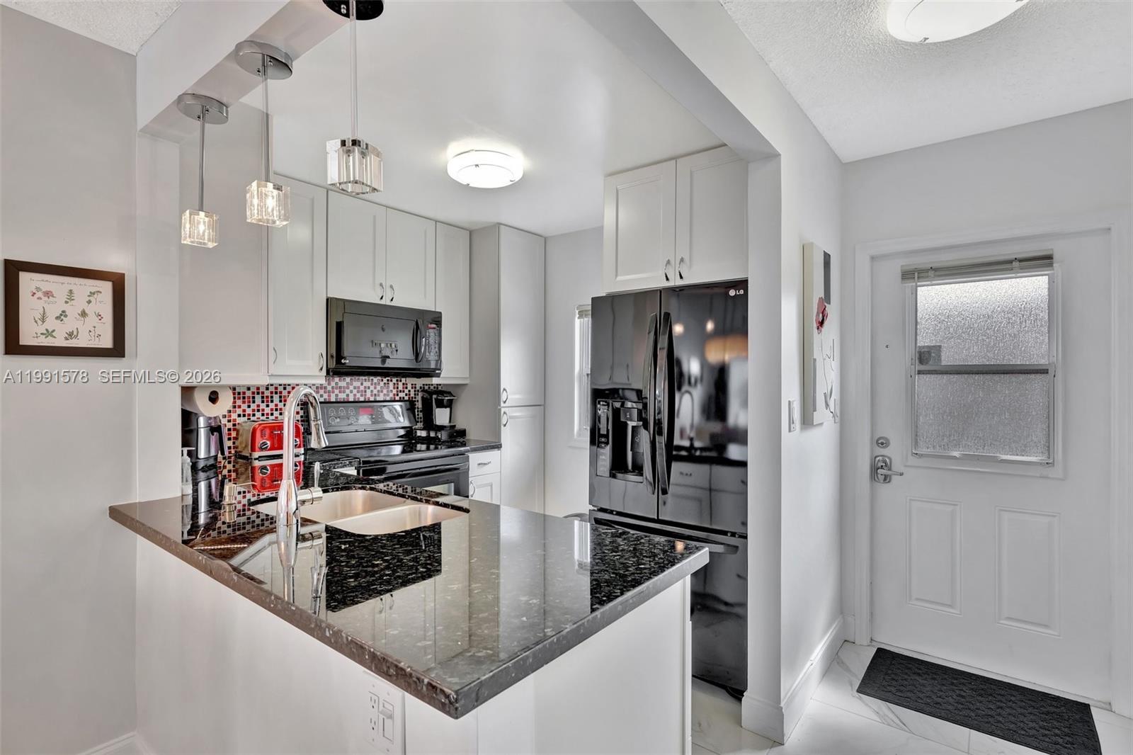 POINCIANA GARDENS CONDO - Residential