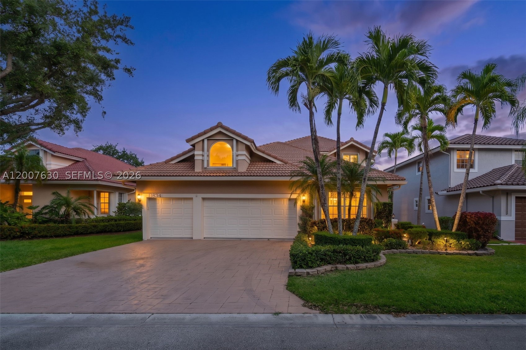 Welcome to your dream waterfront home in the prestigious 24-hour gated community of Eagle Trace in Coral Springs. This stunning two-story residence features 4 spacious bedrooms, 3 full bathrooms, over 4,000 sq ft total with 3,066+ sq ft under A/C, and a 3-car garage. Enjoy an open-concept floor plan with expansive living areas, walk-in closets, and a private Florida oasis featuring a heated pool and screened-in patio. The home includes valuable upgrades such as fully paid solar panels with extremely low electric bills, newer central A/C, energy-efficient water heater, upgraded pool pump, updated flooring, insulation, and more. Eagle Trace offers resort-style amenities including tennis, pickleball, basketball, playground, and a renovated clubhouse. This rare opportunity combines waterfront living, luxury upgrades, energy efficiency, and an unbeatable Coral Springs lifestyle. Schedule your private showing today!