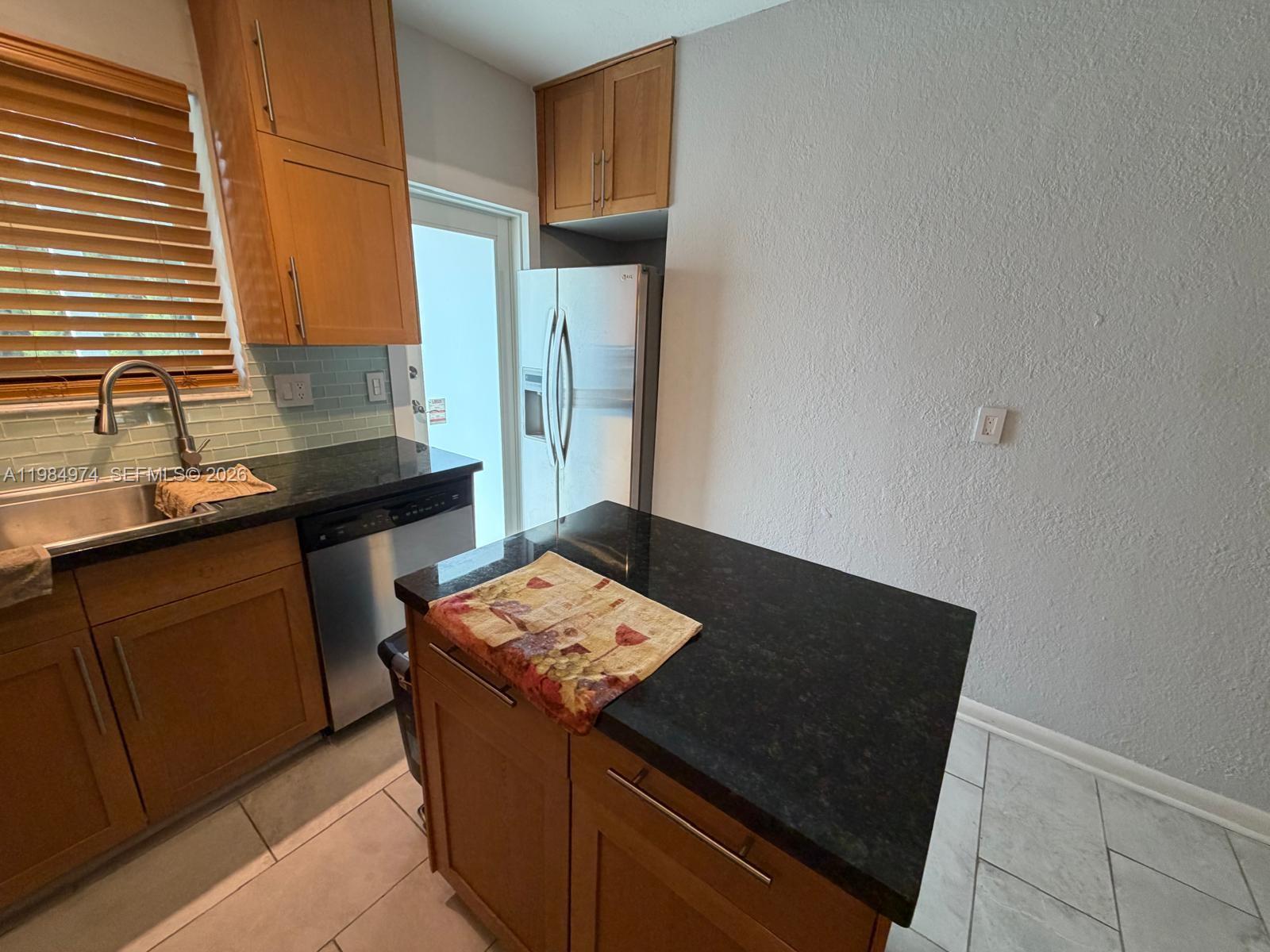 COASTAL GARDEN CONDO - Residential