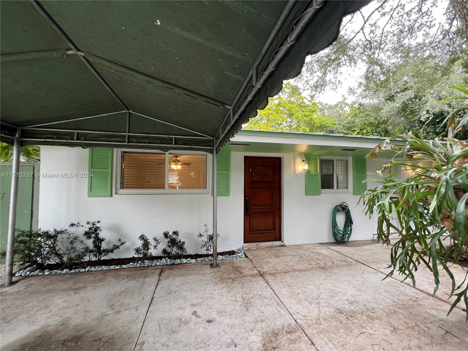 Live on a beautiful street next to the Deering Estate at Cutler.  Located just East of Historic Old Cutler Road in the Village of Palmetto Bay this wonderful property has 3 full bedrooms, new Italian Tile Floors redone kitchen and baths and a large, fenced yard with a storage shed.  Walk to the end of the street to the Deering Estate and watch the sun rise over the water at the people's dock. Convenient to Starbucks and to bike paths and jogging paths. Beautiful trees enhance the ambiance of the home.  Shopping is nearby and Old Cutler Road leads into Coral Gables and Coconut Grove.