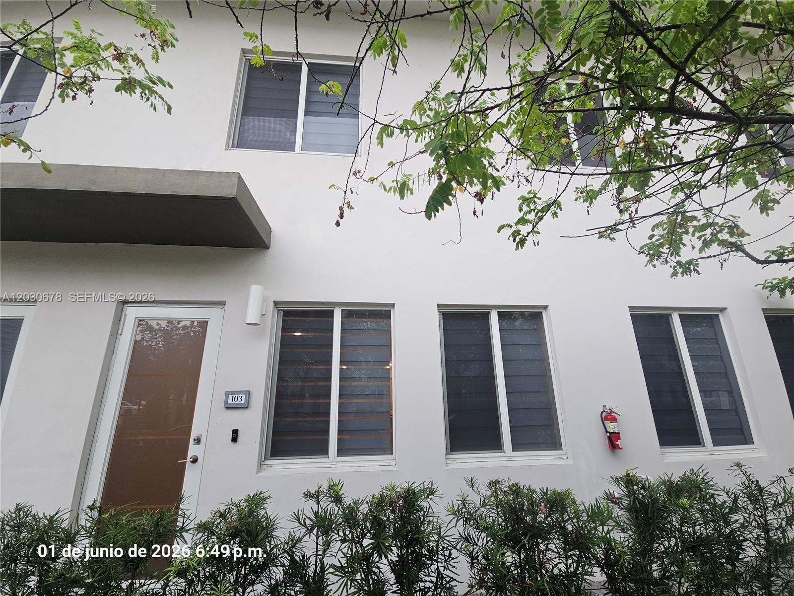 Welcome to a beautifully designed 3-bedroom, 2.5-bath townhouse that defines modern comfort. The main floor features elegant ceramic floors and an open living and dining space, perfect for entertaining or relaxing after a long day. Upstairs, plush carpeted bedrooms create a serene retreat. Throughout the entire home, stylish zebra blinds add a touch of sophistication and control over natural light. Step outside to your private fenced patio—a charming spot for morning coffee, evening dinners, or quiet reflection. Filled with natural light and thoughtful finishes, this home offers a warm, inviting atmosphere where every detail enhances your daily life. Located in a vibrant community near shopping, dining, and major highways, it’s more than just a home—it’s a lifestyle of comfort, elegance, and memorable moments.