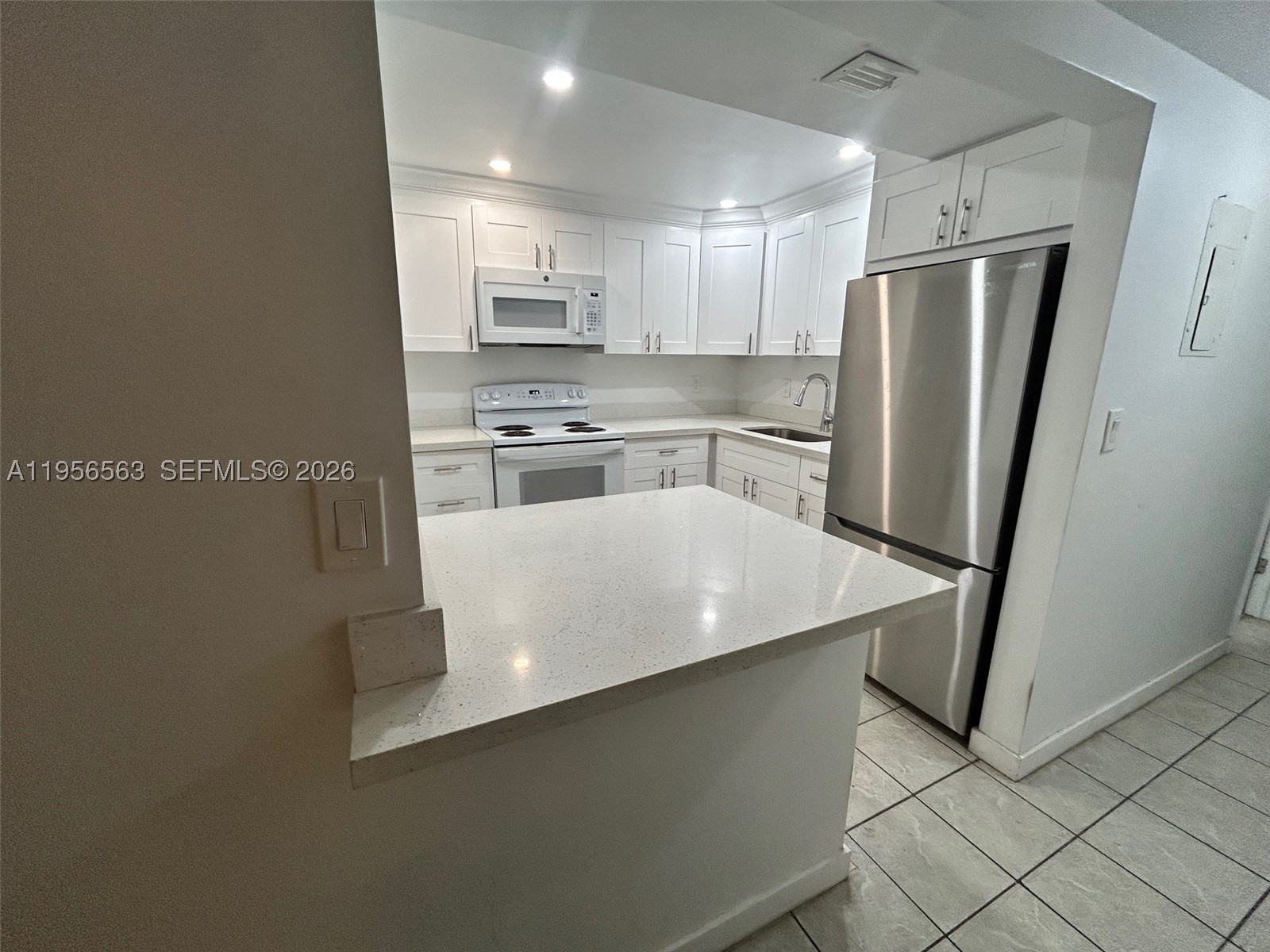 This is a tremendous find for a 2 bedroom, 2 bathroom condominium in Ft Lauderdale! You are minutes away from the Ft Lauderdale International Airport, Downtown, Las Olas, the Court House, Galleria Mall, Universities, beaches, shopping, entertainment and main highways. The property tax is only $971.00 which makes qualifying for a mortgage that more manageable. Edgewood is the up and coming community that is continuing to appreciate in value. Be an owner resident or become a Landlord immediately without restrictions. New roof on the building was completed in 2021. HOA is $563.00 per month. Air Conditioner was installed in 2020, water heater in 2023, impact windows installed in 2020. Laundry facilities on premises. However, you can install your own washer and dryer at the unit. City water and sewer, parking space is letter J. There is a peaceful view of trees and garden from your screened patio and master bedroom window. If you are a pilot or you are a sailor, this location is ideal for you.