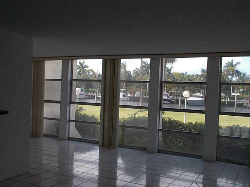 Beautiful 2/2 on the water.  This unit offers stainless steel appliances, granite countertops and and kitchen water view.  Patios in both bedrooms.  Abundance of windows allows great natural light.  Perfect place to relax after a long day.    A must see i n a sought after community.  Carpet in second bedroom being replaced with tile/pergo.