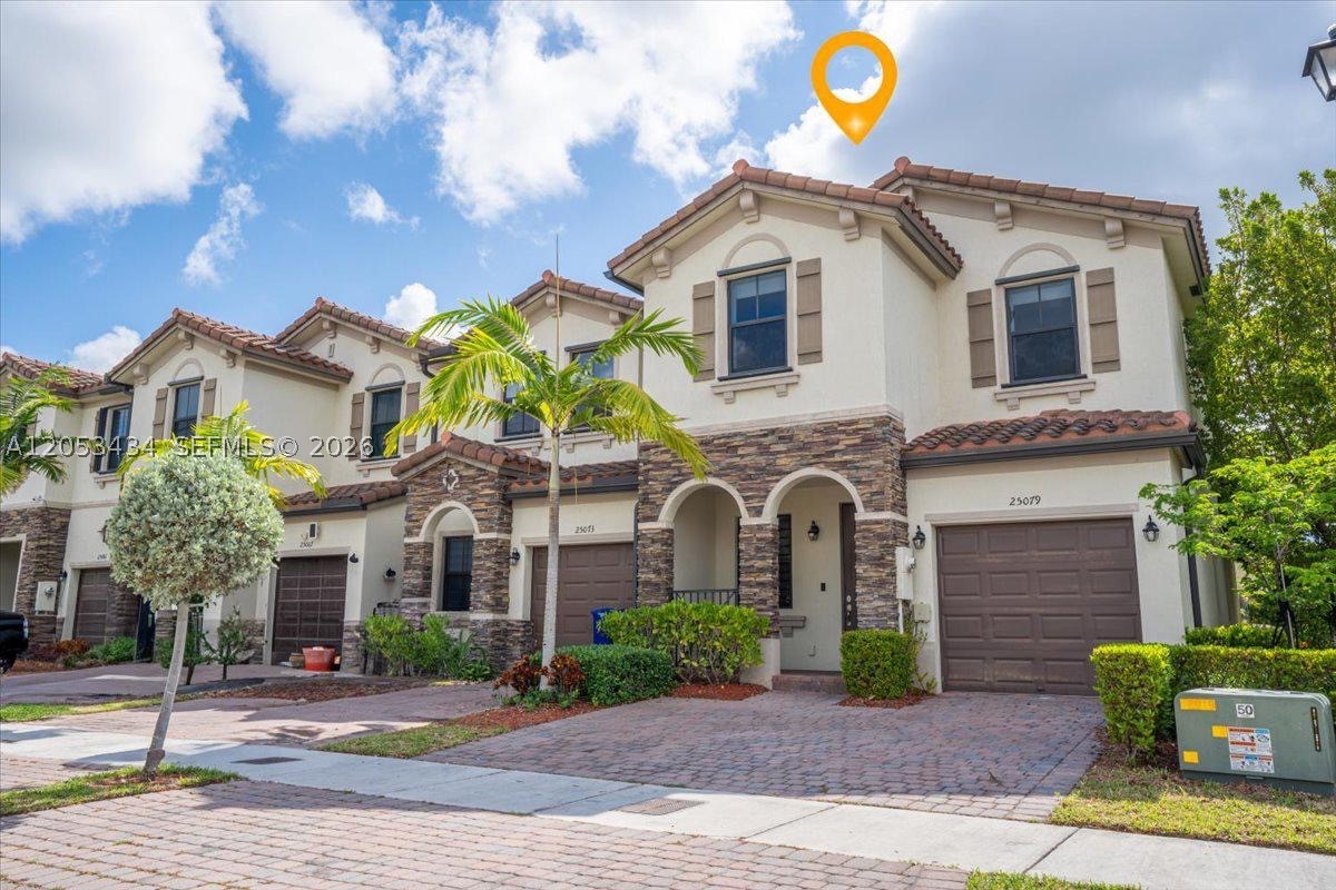 Welcome to this beautifully maintained 3-bedroom, 2.5 bath corner townhome offering the perfect blend of comfort, style, and privacy. The open-concept layout features elegant porcelain tile flooring, stainless steel appliances, a spacious center cooking island, and plenty of natural light throughout. 
The oversized primary suite offers a relaxing retreat with a large walk-in closet and generous living space. Step outside to your private, paved backyard with no direct rear neighbors, ideal for entertaining, family gatherings, or simply unwinding in peace. Located in the highly desirable gated community of Artesa, residents enjoy 24-hour security and exceptional resort style amenities, cluding a clubhouse, swimming pool, fitness center, playground, basketball court, beach volleyball court, and more. Conveniently located near major highways, shopping, dining, schools, and the Florida Keys. Don't miss this incredible opportunity , schedule your private showing today!