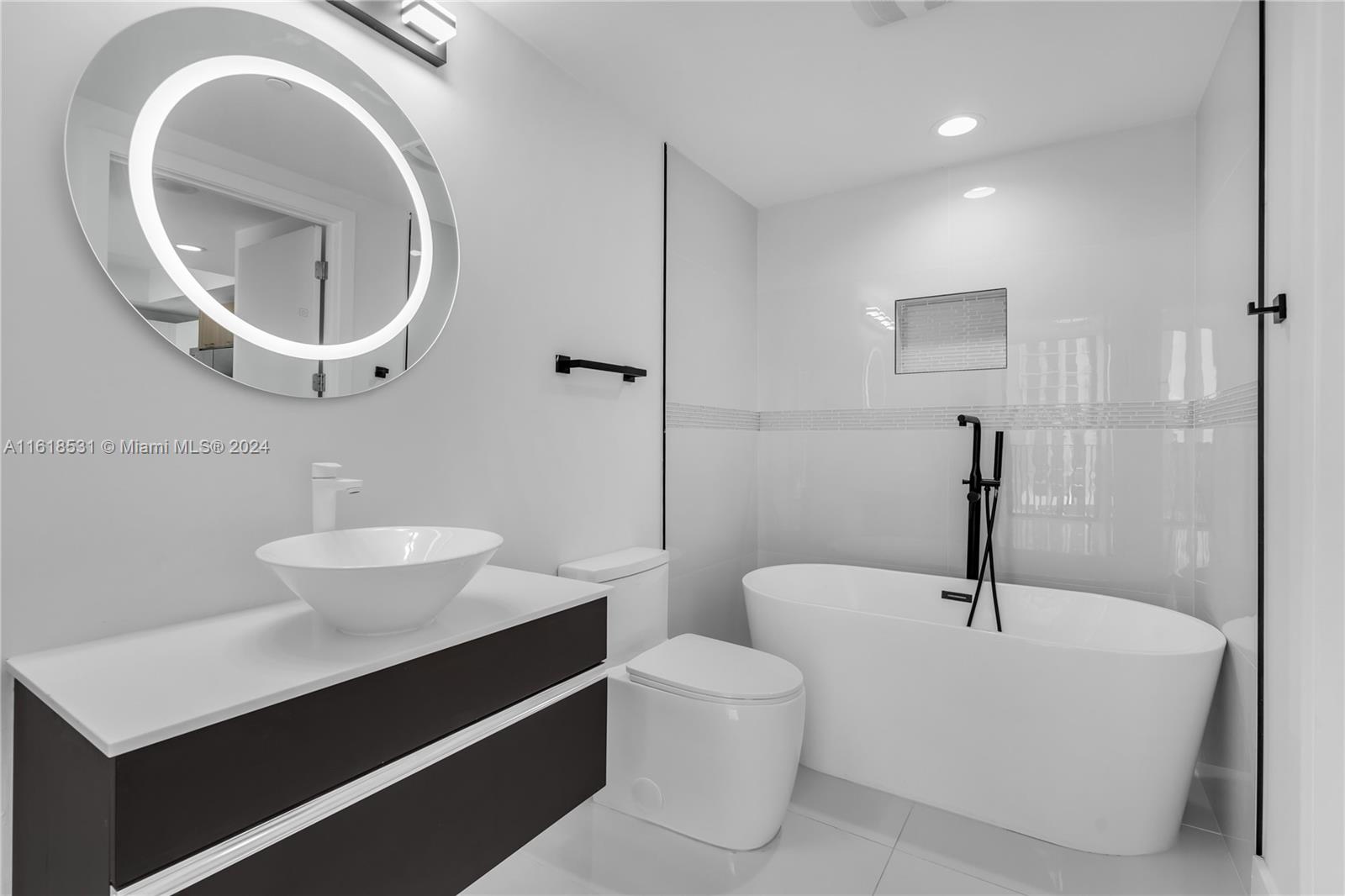 2-bedroom, 2-bathroom apartment in the heart of downtown Doral at Paseo! 03 LINE !  With tile flooring throughout, a modern kitchen, BOTH BATHROOMS have been COMPLETELY CHANGED/UPGRADED, this unit offers a perfect blend of style and functionality. Enjoy the breathtaking views of downtown Doral from not one, but TWO BALCONIES, making it the ideal spot to unwind after a long day.