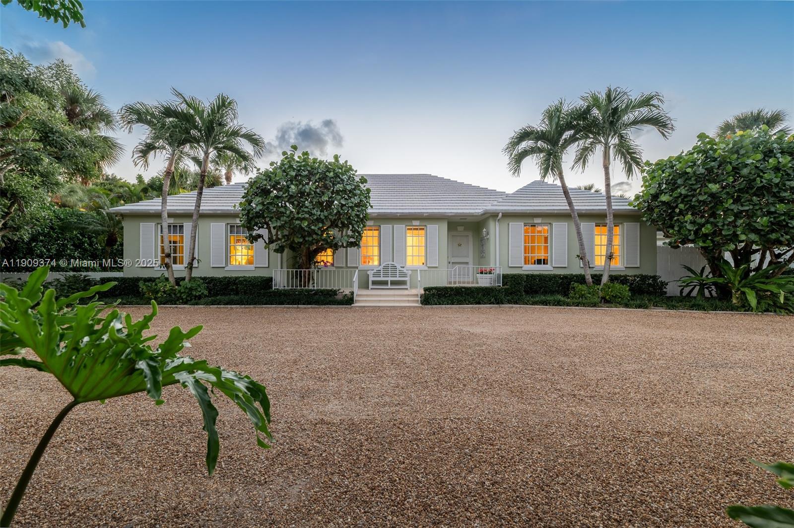 A serene and beautifully appointed Jupiter Island property, 18 Gomez Road features a 4-bedroom, 4-full bath main house with an expansive living room, kitchen, and dining area, as well as a charming 1-bedroom, 1-bath guest house. The screened-in porch opens to an oversized pool and veranda—perfect for enjoying stunning western views of the golf course, Bassett Creek, and the Intracoastal Waterway. Nestled among mature gardens on one of the Island’s most coveted streets, this home offers privacy, endless opportunities, and timeless island living.