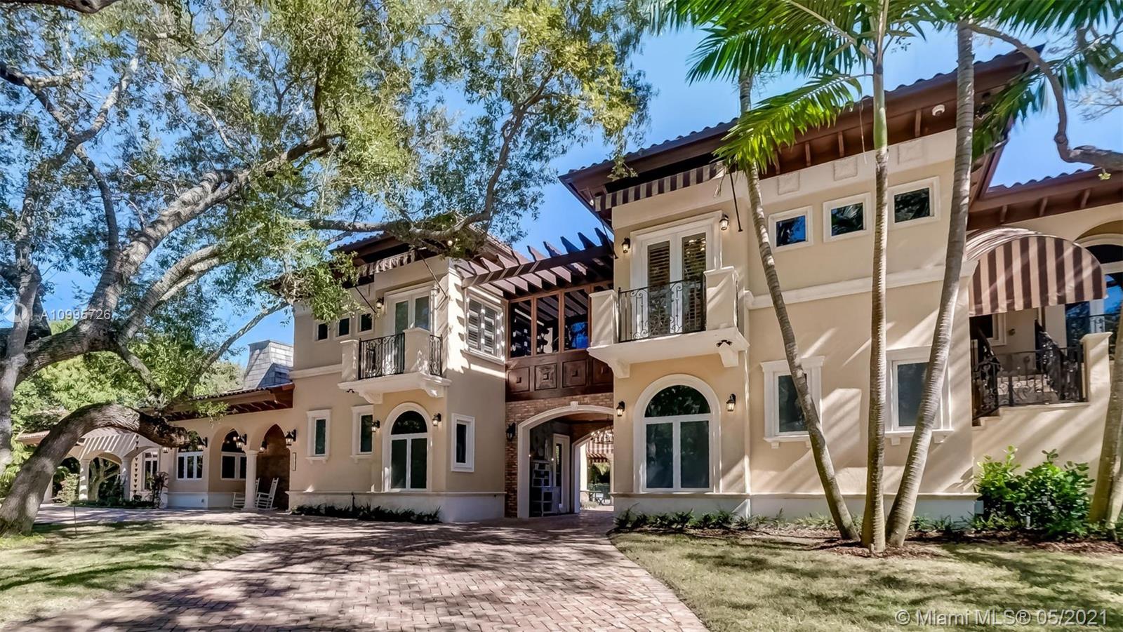 Absolutely luxurious Custom Pinecrest Estate with incredible detail & quality. The 6,100 sq ft residence offers 4B/4.5B all ensuite, with a guest house, large office space, media room, elevator and so much more! This immaculate home transports you to a beautiful chateau in France. The property offers custom gourmet kitchen, custom built-ins, fireplaces throughout, natural light pours through the home accenting vaulted ceilings, with wood & marble floors. Features include a 4 car garage, a second floor movie, bar & lounge area featuring a glass floor overlooking your garage, wine storage, exceptional outdoor recreational spaces, extra large+stunning pool/spa built in 2019, basketball court, covered wrap-around patio. Lush landscaping that make it perfect for both relaxing & entertaining.