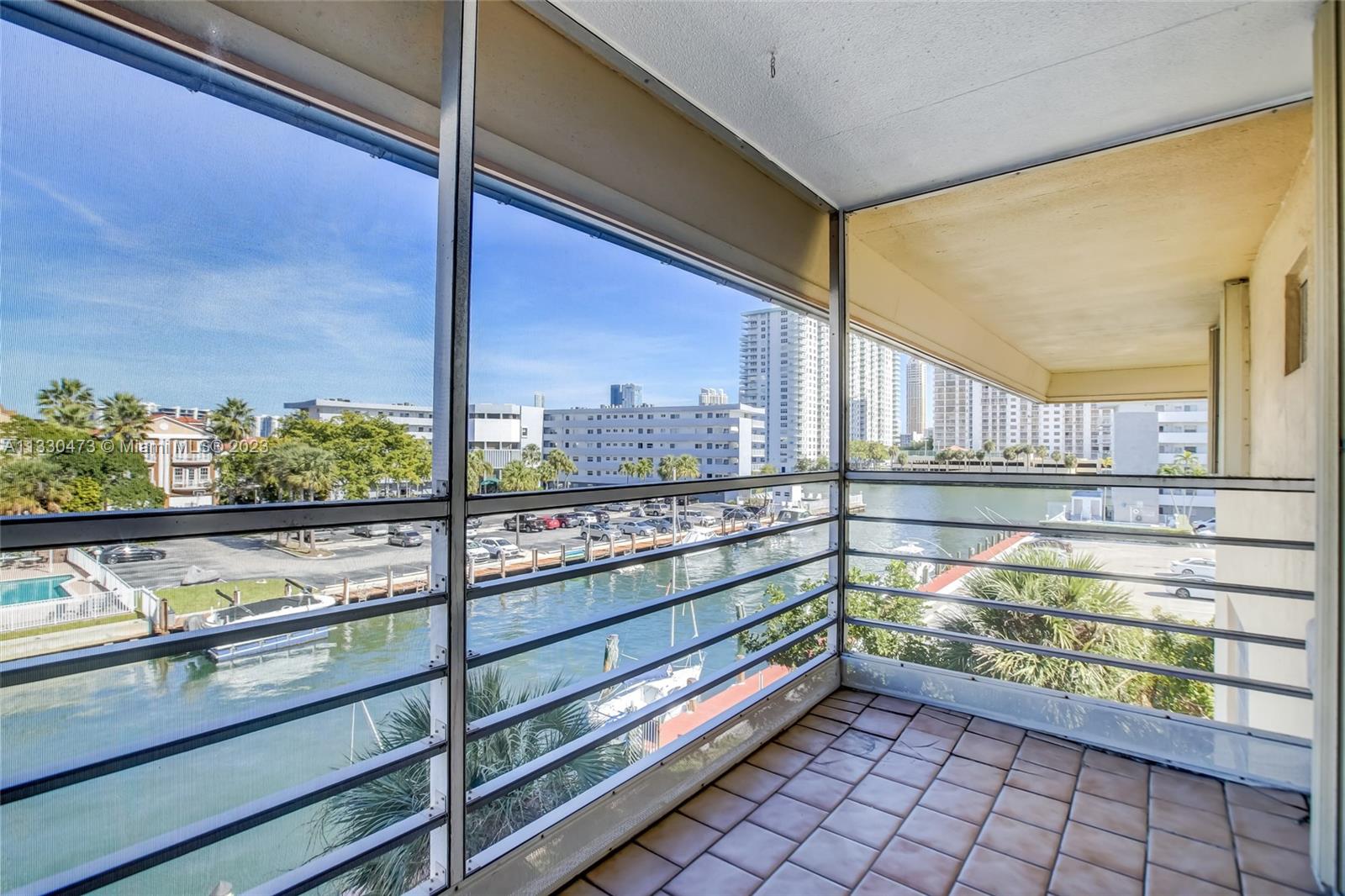 Enjoy beautiful water views from your spacious 2 bedroom 2 baths corner unit on the 4th floor. Located within the quiet guard gated community of Eastern Shores in a 55+ condo directly on the water with ocean access. Unit has been well maintained. Large Primary bath and walk in closet. Community has a club house, gym, swimming pools and plenty of guest parking. Association includes Water, and reduced Cable & Internet bill. Laundry facility on each floor. Minutes to the beach, shops, restaurants, Oleta Park, Aventura Mall, and much more. At least 1 resident must be over 55 years of age. Seller will pay all special assessments.