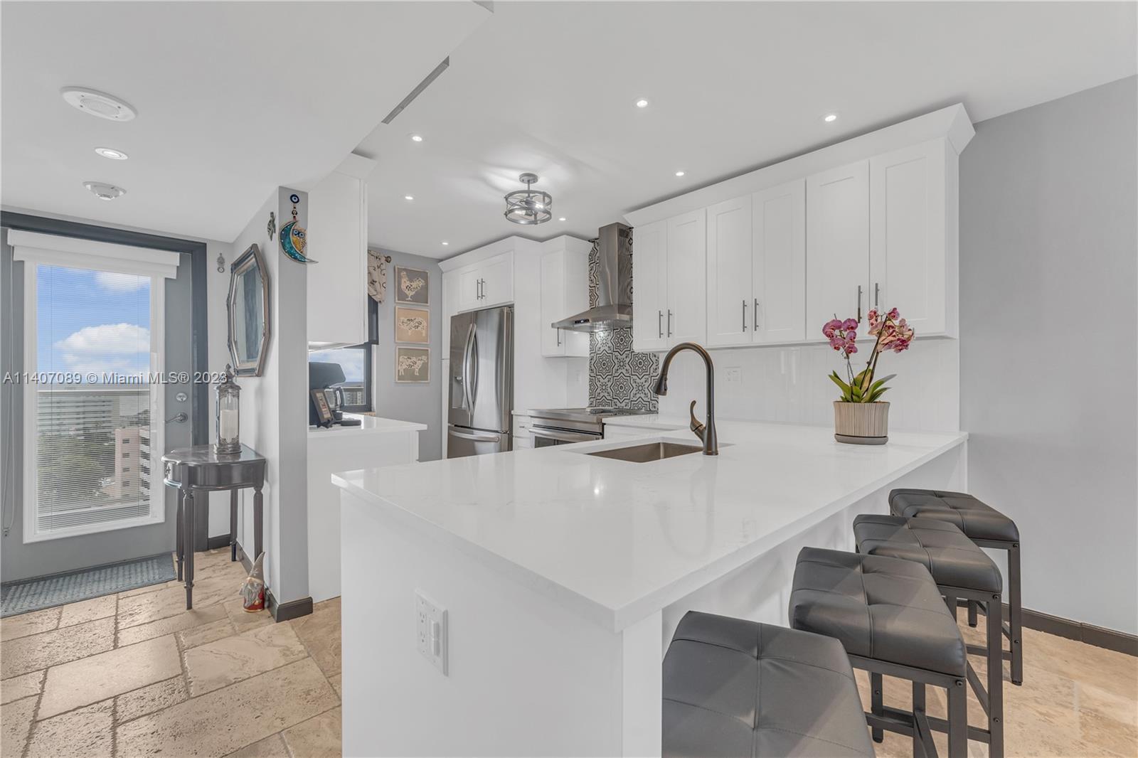 This stunning condo has been fully renovated to the highest standard & is located just 1 block west of the beautiful Pompano Beach. The living area is flooded w/natural light & features modern finishes throughout. The open plan kitchen boasts SS appliances & ample cabinet space. The dining area is perfect for entertaining guests, w/a comfortable living room. The master is a true oasis, w/a luxurious en-suite bathroom & large custom built WIC. The 2nd bd is also generously sized & features a sizeable closet. Your own private balcony w/stunning views of the intracoastal. This condo is in the perfect location for enjoying all that Pompano Beach has to offer including stunning sunrises & breathtaking sun settings. Buyers Agent must accompany at all times. 40yr cert was completed 9/29/2021.