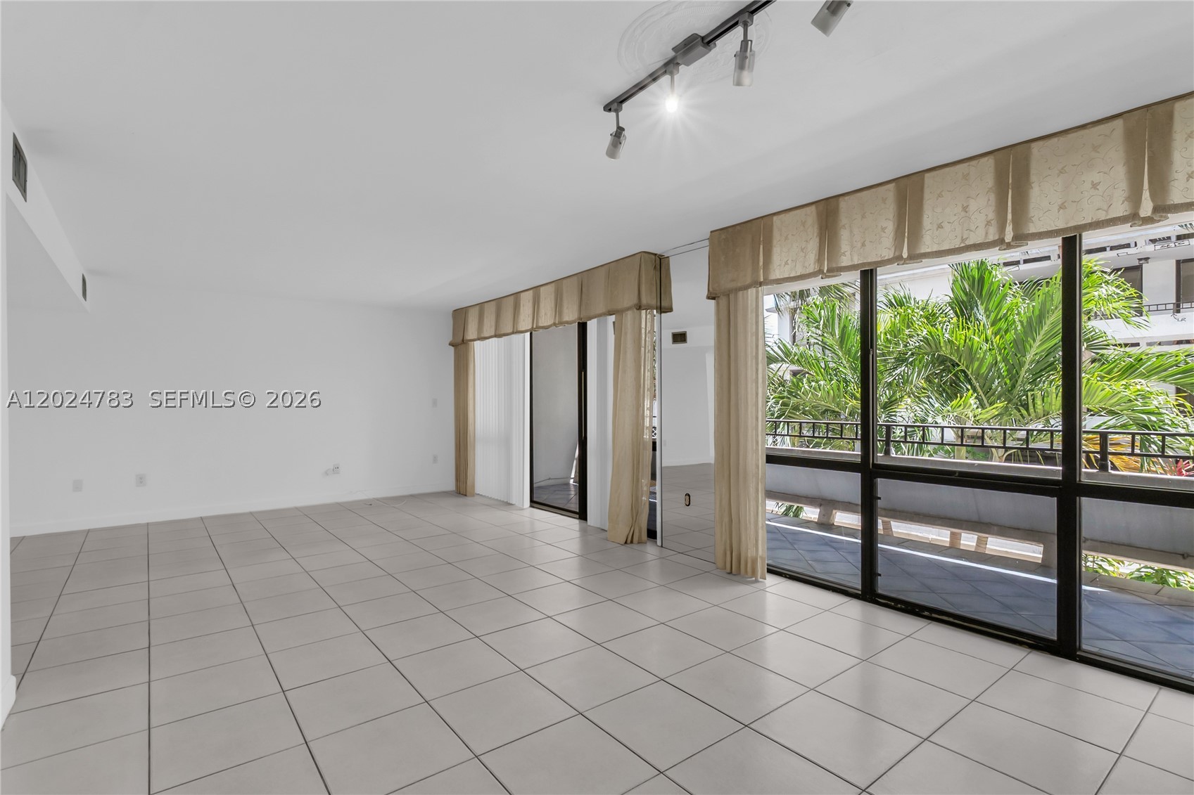 Live in the largest corner unit in a prestigious community of Kendale Lakes, orrering 1 848 sq feet.  Conveniently located on the second floor of building A, this residence features one master bedroom, two additional bedrooms (three bedrooms total), and two and a half bathrooms. The huge kitchen includes its own private entrance, a pantry, and a laundry room. A large balcony wraps around the living and dining areas, providing plenty of natural light and outdoor space. This residence also features two large walk-in closets along with ample additional closets and storage space throughout. The residence comes with an extra storage room and an assigned parking space. The building offers beautiful landscaping, a renovated heated pool with sauna, barbecue area, and many more amenities. Enjoy resort-style common areas in this gated community with 24/7 security, a secured lobby, and on site managmente. Centrally located near malls, supermarkets, and expressways. 
The seller will pay the assessment at closing, allowing the new buyer to move into a renovated building with no assessment balance.