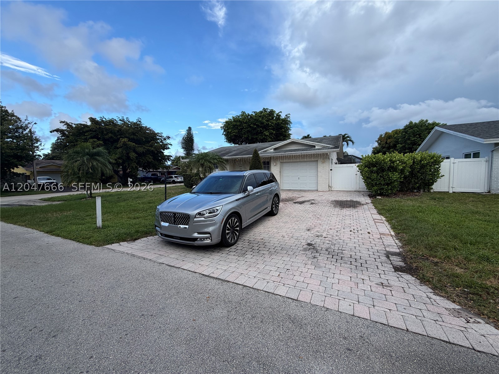 Pool home located in the desirable Palm-Aire Village community of Fort Lauderdale! This 3-bedroom, 2-bathroom home offers a functional layout with great potential for renovation and customization. The property features a spacious living area, generously sized bedrooms, and an attached garage. Step outside to a fully fenced backyard with a screened-in pool and covered patio, providing an excellent foundation for creating your own outdoor retreat. The home is in need of updates and repairs and is priced accordingly, making it an excellent opportunity for investors, renovators, or buyers looking to add their personal touch. Conveniently located near Florida's Turnpike, shopping, dining, parks, and just a short drive to the beaches. Don't miss this chance to transform this property into something special!