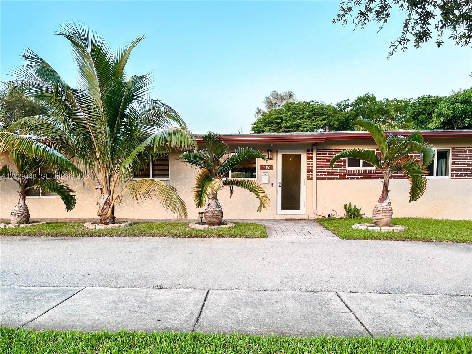 single family property on oversized corner lot with new Impact Windows, and Electric Curtains in Front and Back Doors, Custom curtains on all windows, Hurricane rated Garage door, , Appliances and Smart Tv's ,Fans, Lights Etc. 2 Zone a/c main unit 2019, Main roof 2019, Updated Electric, Lg. walk in closet, New washer and Dryer, New Int and Ext. paint, Solar Hot Wtr Heater, Custom Paver Patio, Heated Saltwater Pool & Spa w/waterfall with new pool heater. Custom built in BBQ, fenced yard, sprinkler system and new automation system , Lychee tree, Mango and Avocado tree. Boating Ramp located 3 blocks from the house.