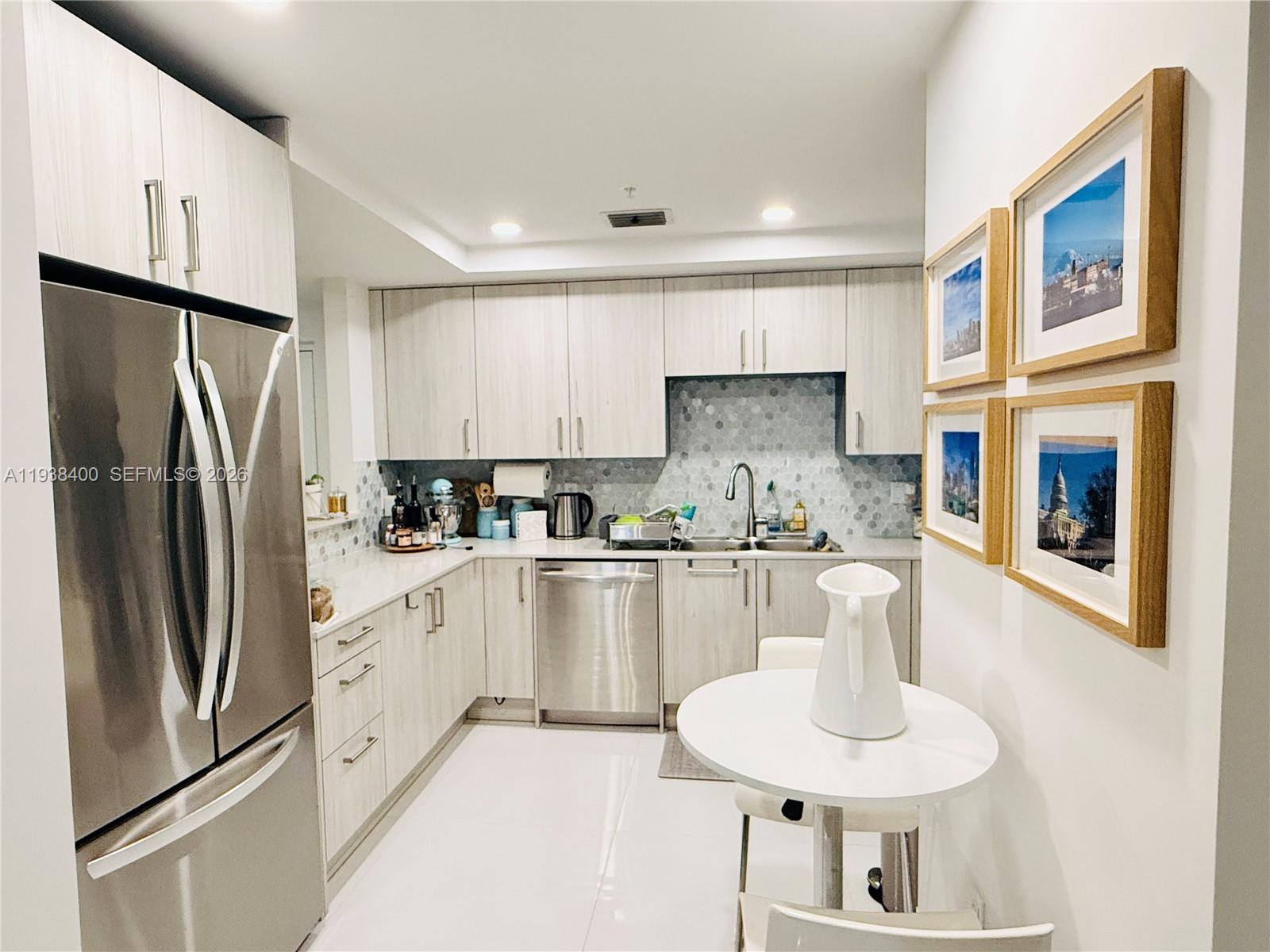 Enjoy living in your dream condo in the heart of Doral, this stunning unit with two bedroom, 2 bathroom is conveniently located in the first floor, open and modern floor plan, beautiful kitchen with stainless steel appliances, Backsplash  and granite counter top, impact windows. The Master Bedroom features a walk-in closet and comfortable master bathroom. Second bedroom with ample closet space, the living room opens up to a private balcony. This unit also includes two covered cars parking garage, washer and dryer and great amenities to enjoy relaxing days in a well maintained building, excellent schools, close to Highway, Restaurants, Shopping Center, Supermarket, Parks. 
Water & Internet is included with Hoa fees.