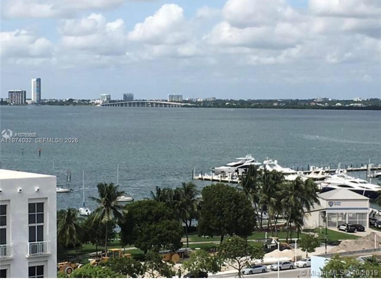 top floor with amazing bay and intercostal view ,large balcony, large master bedroom with full bathroom and walk in closet ,full 2th bathroom , kitchen with new steel appliances , den ,new air/conditioner machine ,city allowed to install washer and dryer in the unit  walking distance to trader joe's , Lincoln rd, marina with water taxi , best restaurants and all you need .Venetian Bridge is just on the corner .top amenities bldg, pool,jacuzzi,club room, gym ,bbq area,laundry,
apt is rented with good income (lease expire in july 2026)tenant 60 days notice to leave
text agent