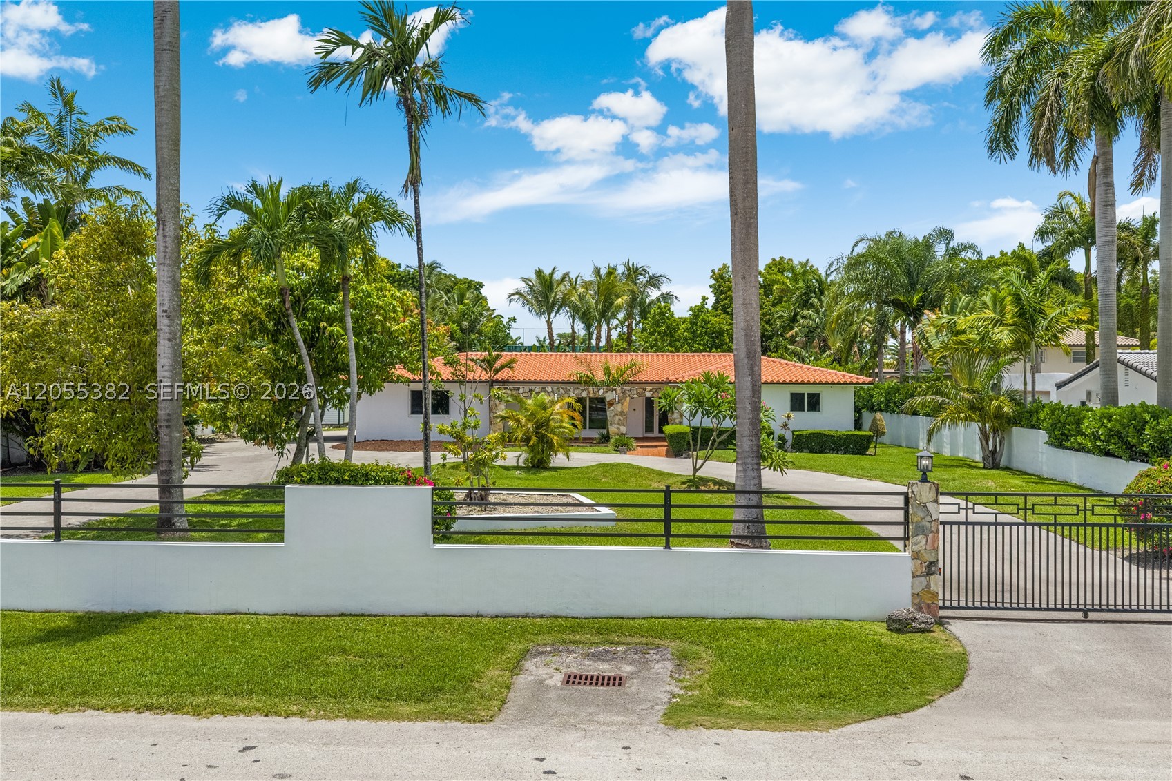 Spacious 4-bedroom, 3-bathroom residence situated on an oversized 34,200 SF lot in a prime Miami location. This move-in ready home features a renovated kitchen with stainless steel appliances, newer central A/C, impact windows and doors, spacious living areas, and a 2-car garage. Enjoy your own private oasis with an automatic heated pool and expansive backyard. Conveniently located near major highways, Miami International Airport, Dolphin Mall, restaurants, and top-rated schools. Price includes Pool and Lawn Maintenance.