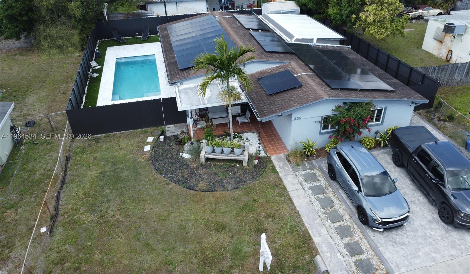 Let's go!  Come to the Open!  This is the deal! Enjoy a three bedroom and two bath pool home on a quiet, tree-lined street that is totally remodeled and upgraded to incredible standards.  Please call for your showing.  Come to the open houses!  New roof, plumbing, electric, solar with Tesla Battery Wall, New pool and patio! Hurricane windows, new kitchen, bathrooms, doors, paint, hardware. All in immaculate condition.  This is a great home for you to entertain in!  Special!!!! ***FOUR YEARS FREE POWER!***  Seller credit!  conditions apply.  Agents see Broker Remarks for access instructions.