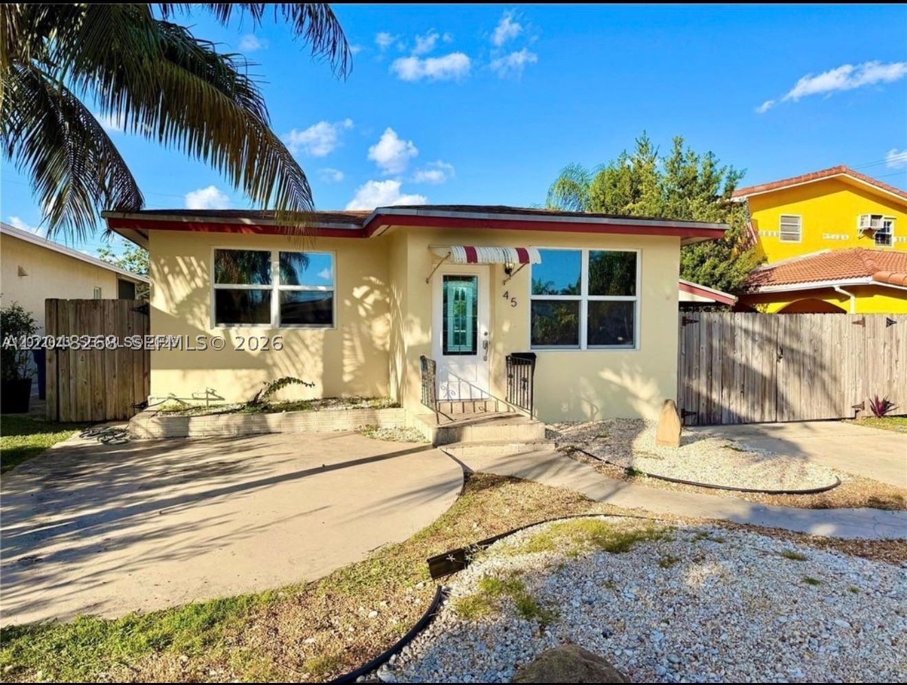 Welcome to this beautifully maintained  2 bed 1 bath  home in the East Dania Beach area! Front House is a 2 bed 1 bath with laundry, Attached in back is a one bedroom and one bath with a private entrance currently rented monthly. Well qualified tenants can do first and security deposit water sewer, trash and lawn maintenance is included with the rent payments. Pets are OK with a deposit. BEST LOCATION & NO HOA Just a short drive or a scenic bike ride to the beach, Very close to downtown hollywood many shopping areas and restaurants. Close to Olsen middle school and South broward high. Unit has open floor plan with abundant natural light, impact windows for safety and energy efficiency. WOOD FLOOR living room and bedrooms and TILE in kitchen. Granite counter tops in kitchen. The large fenced yard provides ample space for outdoor entertaining.