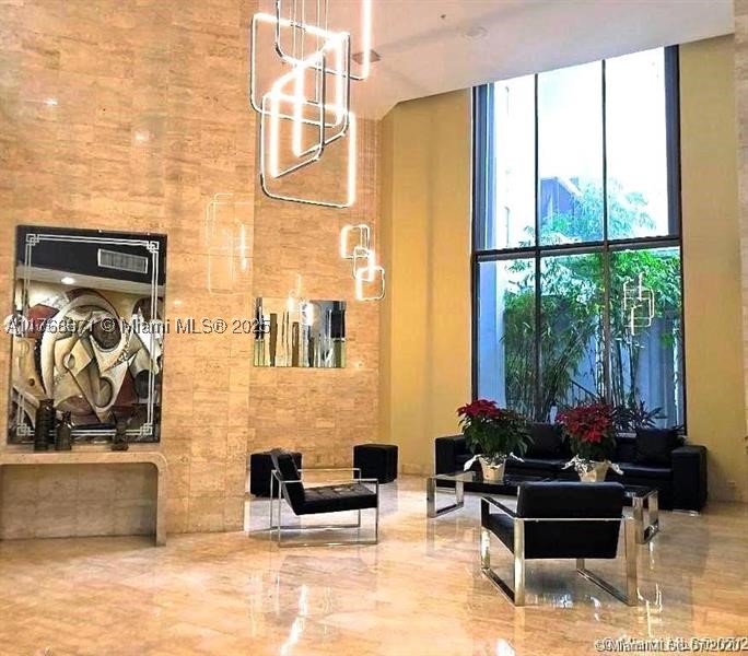 Huge reduction for a quick saòe. This is a great opportunity to own this totally remodeled, bright, elegantly furnished 1/1/1 apartment in a full-service condo. The building features two swimming pools, two gyms, and a tennis court. Covered parking space, plus guest parking. Please read broker remarks.