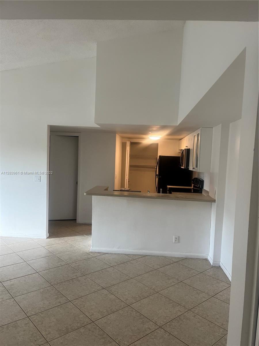 LAKES OF JACARANDA BLDG 1 - Residential Lease
