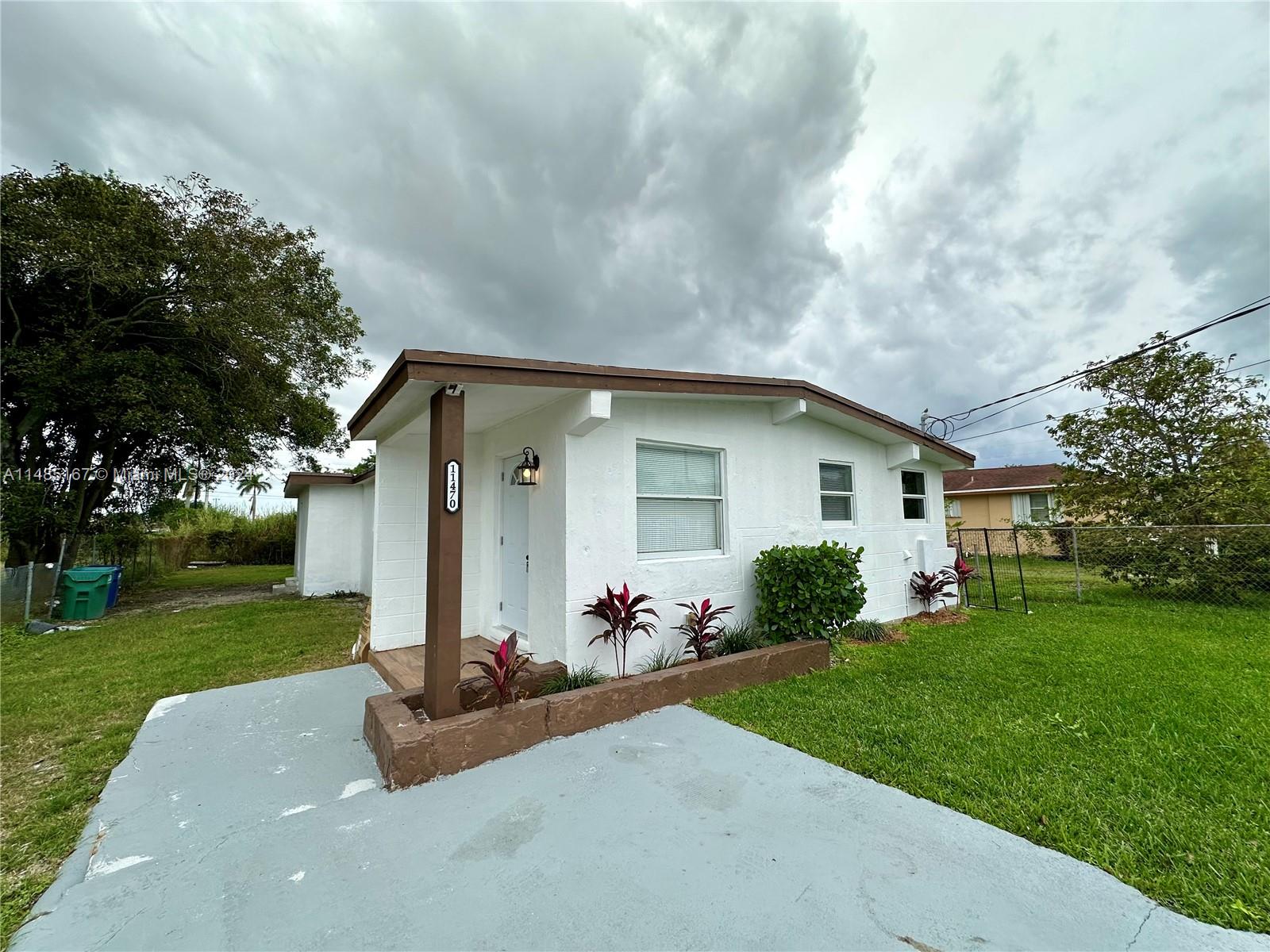 This single-family home is completely remodeled featuring 4 bedrooms and 2 baths. With a new roof, plumbing and electrical. Great investment opportunity!! As it has the ability to convert into a duplex. Or perfect for a family with space for an in-law quarters as it has it's own private entrance and kitchenette. Enjoy the privacy of this gated home all throughout with ample space perfect for entertainment with the opportunity to build a pool or for Boat/RV parking. Property is bigger than tax roll.
