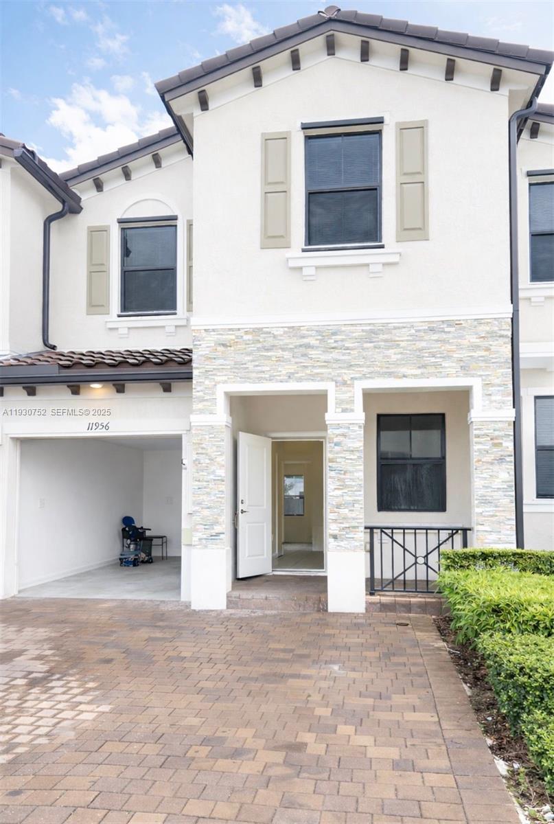 Impeccable Townhouse at the beautiful resort style. 4 bed | 2.5 baths garage and patio. Located in the new a  community built-in 2022, spacious rooms, kitchen with counter tops, stainless steel appliances. Open layout concept to the family room. Tiled first floor and carpet on second floor, hurricane protection. This resort style community offer all the amenities including club houses, with pool, game room, gym. Conveniently located minutes from Florida Turnpike  with easy access to main streets . Don't miss this opportunity!!