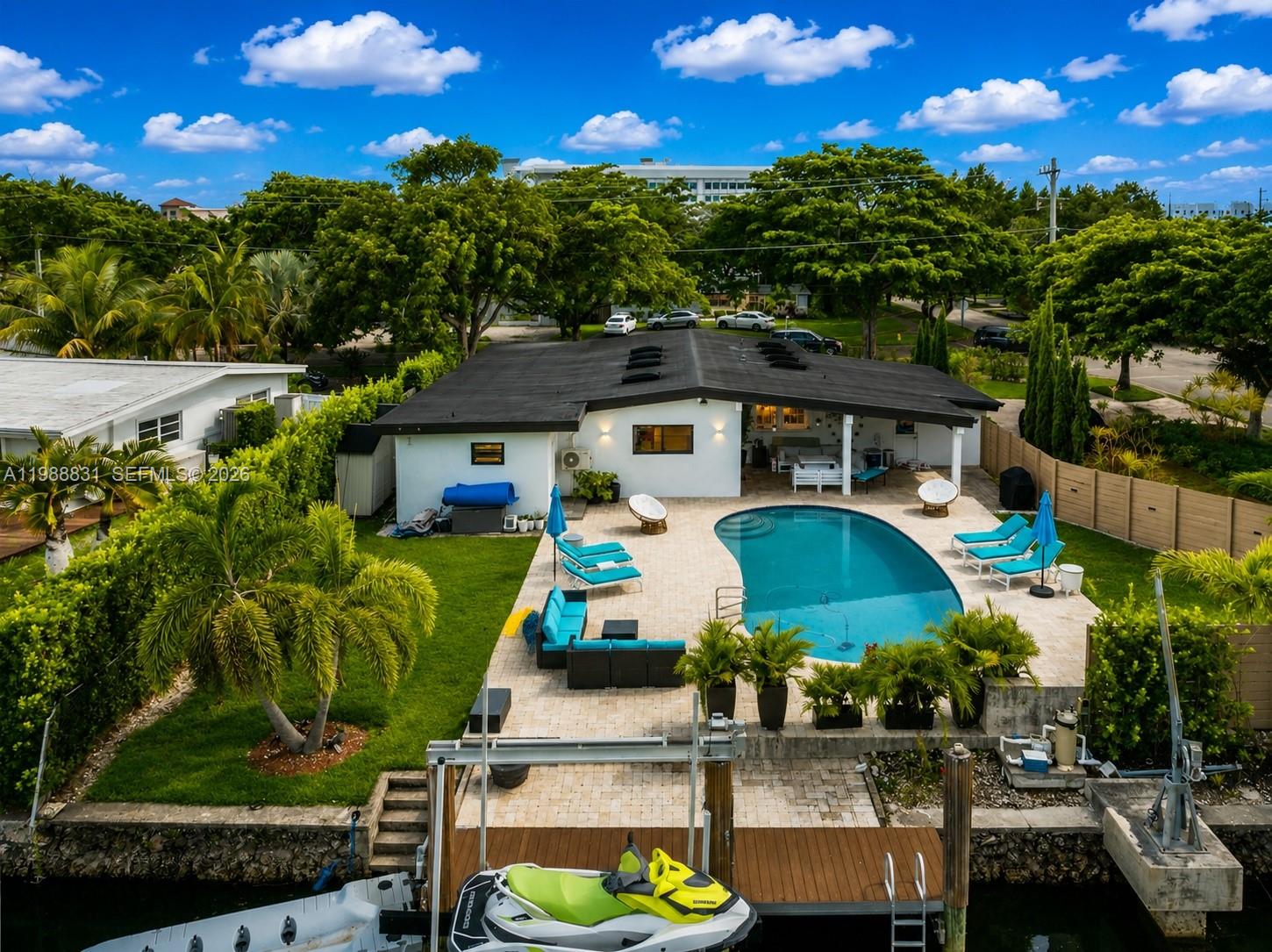 BOATER’S Paradise in Keystone Islands!

95 ft waterfront, no fixed bridges, direct ocean access. 16K lb lift + 5K lb davits.

4BD/2BA on a large private corner lot with circular driveway. Open layout, saltwater pool, spacious patio & fenced yard.

Updated kitchen, impact windows, high ceilings, marble floors, recent roof.

24hr notice to show