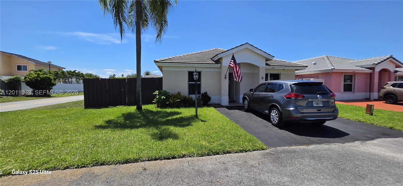 Welcome to this beautifully maintained corner-lot residence featuring 2 bedrooms and 2 bathrooms, ideally located in the heart of Miami Gardens. Nestled within a gated community with restricted access, this inviting home offers the perfect combination of comfort, space, and convenience. The property features a spacious and cozy layout, a well-kept kitchen in excellent condition, and a screened pool enclosure ideal for relaxing or entertaining year-round. Its desirable corner-lot location provides added privacy, curb appeal, and extra outdoor space. Conveniently situated near major shopping centers, dining, entertainment, and everyday conveniences, this home offers an exceptional lifestyle in a highly sought-after central location. A wonderful opportunity for homeowners or investors alike — schedule your private showing today.