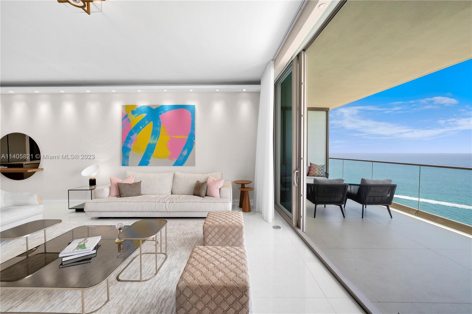 Welcome to this impeccably designed residence at Armani Casa. This exquisite condo features three bedrooms, a fully functioning den with a bathroom and closet, and maid quarters with a bathroom and closet. Enjoy breathtaking ocean and Intracoastal views from the two oversized terraces, complete with a convenient summer kitchen. Every detail has been thoughtfully upgraded, including custom Italian closets, wallpaper, electric blinds, and light fixtures. Armani Casa offers a wealth of luxurious amenities, including a restaurant, coffee bar, swimming pool, beach service, expansive fitness center, spa, beauty salon, kids playground, and a cigar lounge. Indulge in the epitome of elegance and sophistication at this remarkable residence.