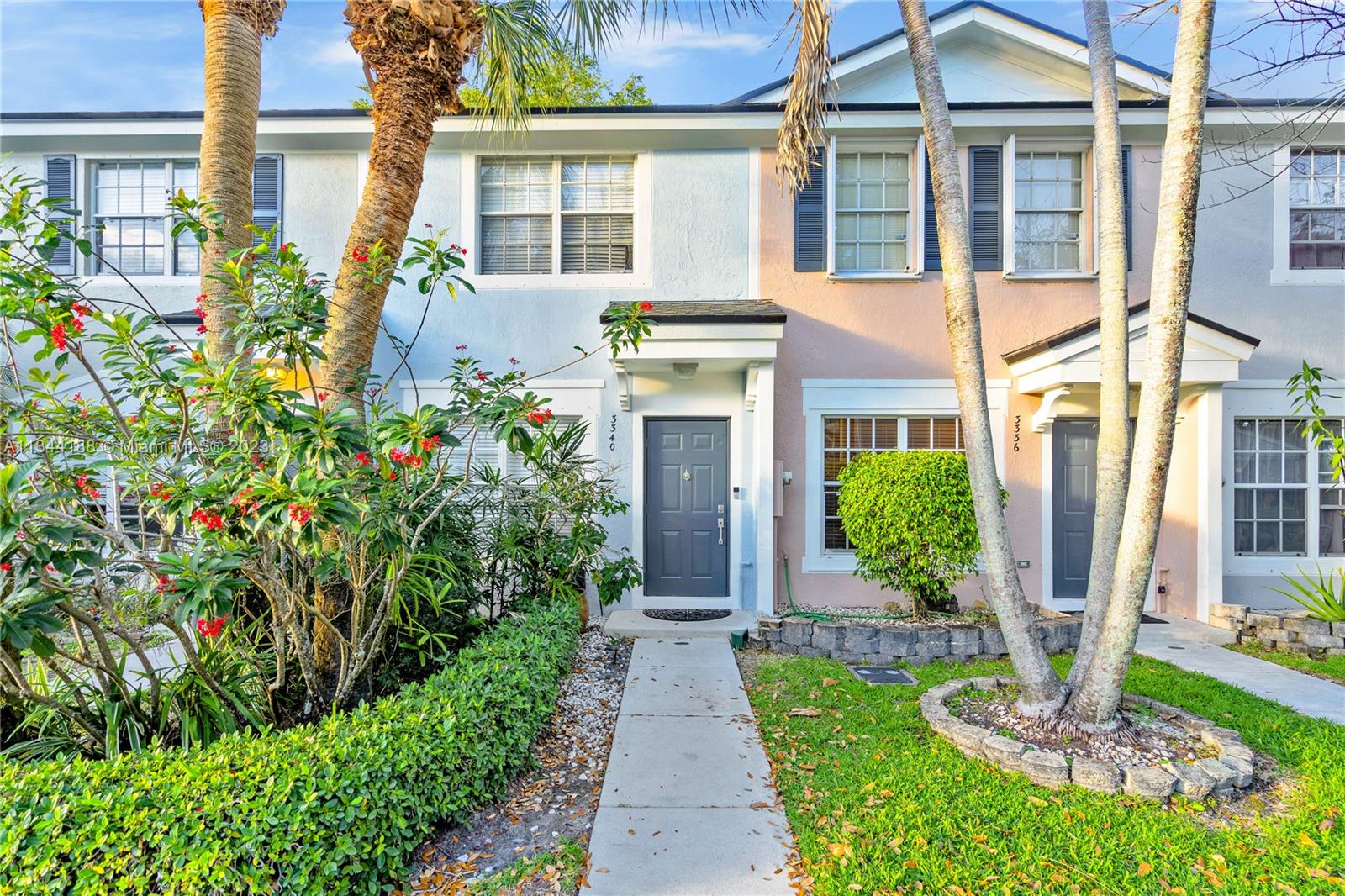 Beautiful townhouse located in the gated community of Fiesta! This updated townhouse features 2 beds 1.5 bath, modern kitchen with stainless steel appliances, tile flooring all throughout first floor with wood on the second. Remodeled bathrooms and stacked washer and dryer and a screened backyard patio. This quiet community has two entrances with security gate for easy access to your home as well as protection. Bring your family and friends to the community pool for some fun and relaxation. This property is a must see, call and schedule your showings today!