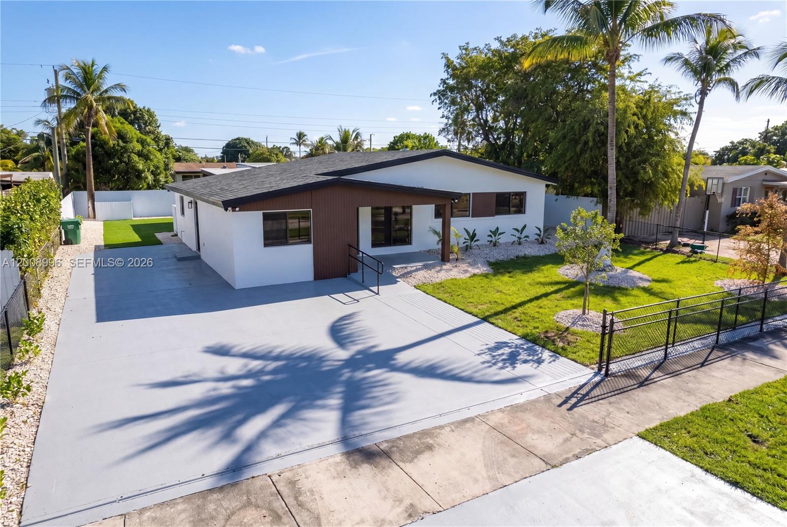 Gated, fully renovated home in a high-demand neighborhood. Outfitted with all impact windows and doors and a brand-new roof—move-in ready !

Open concept layout with modern finishes, oversized living areas, strong natural light and fully built out closets in every bedroom.

Expansive driveway with ample parking, including space for a boat or RV. One of the few homes nearby with a private pool, creating a true indoor-outdoor setup perfect for entertaining !
SELLER WILL CONTRIBUTE $15,000 TOWARDS CLOSING COST !